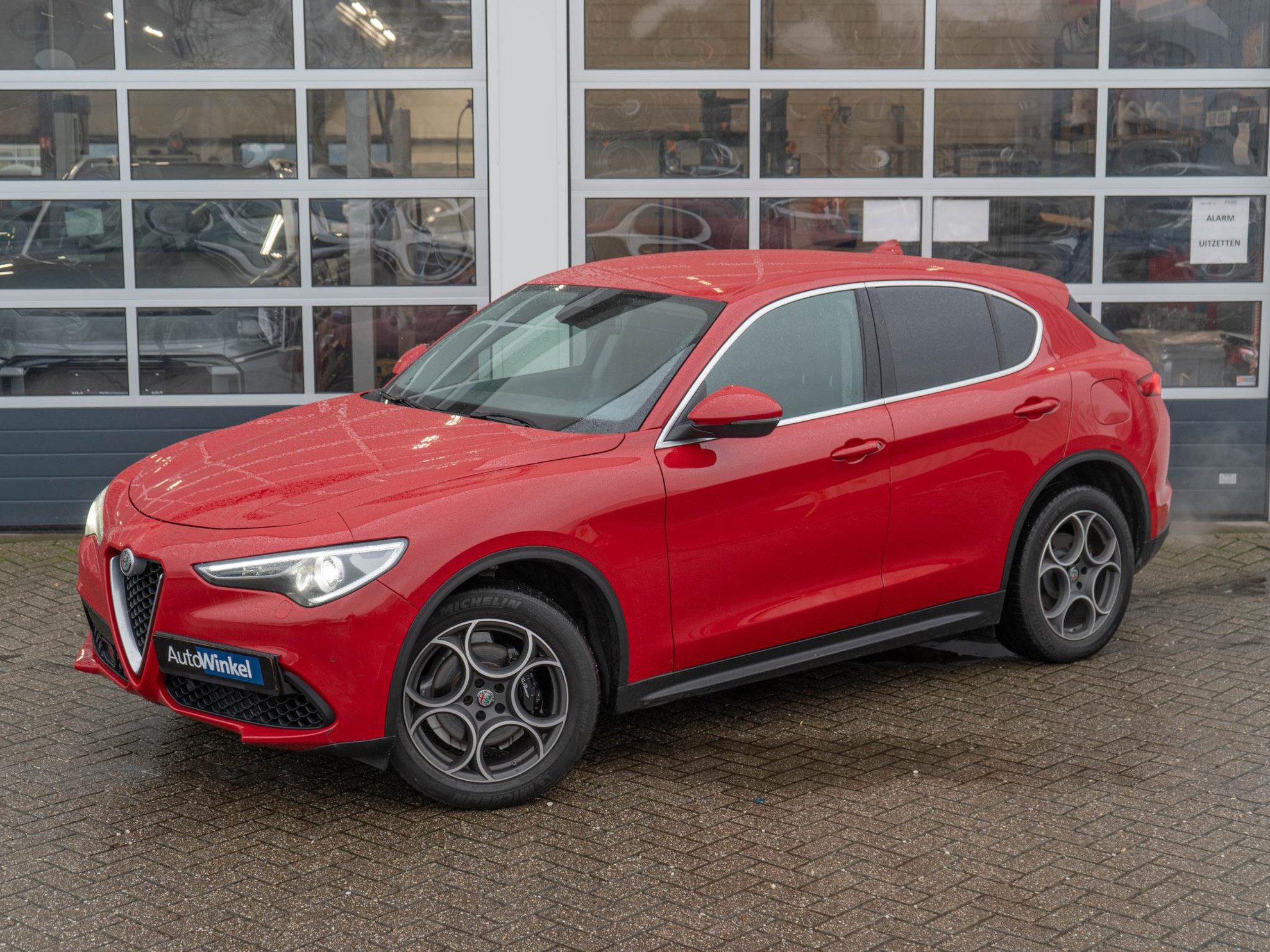 Alfa Romeo Stelvio 2.0 Turbo Aut. AWD 280pk First Edition | Rosso Alfa | 20” LM | Navi | Clima | Stoel-/Stuurverwarming