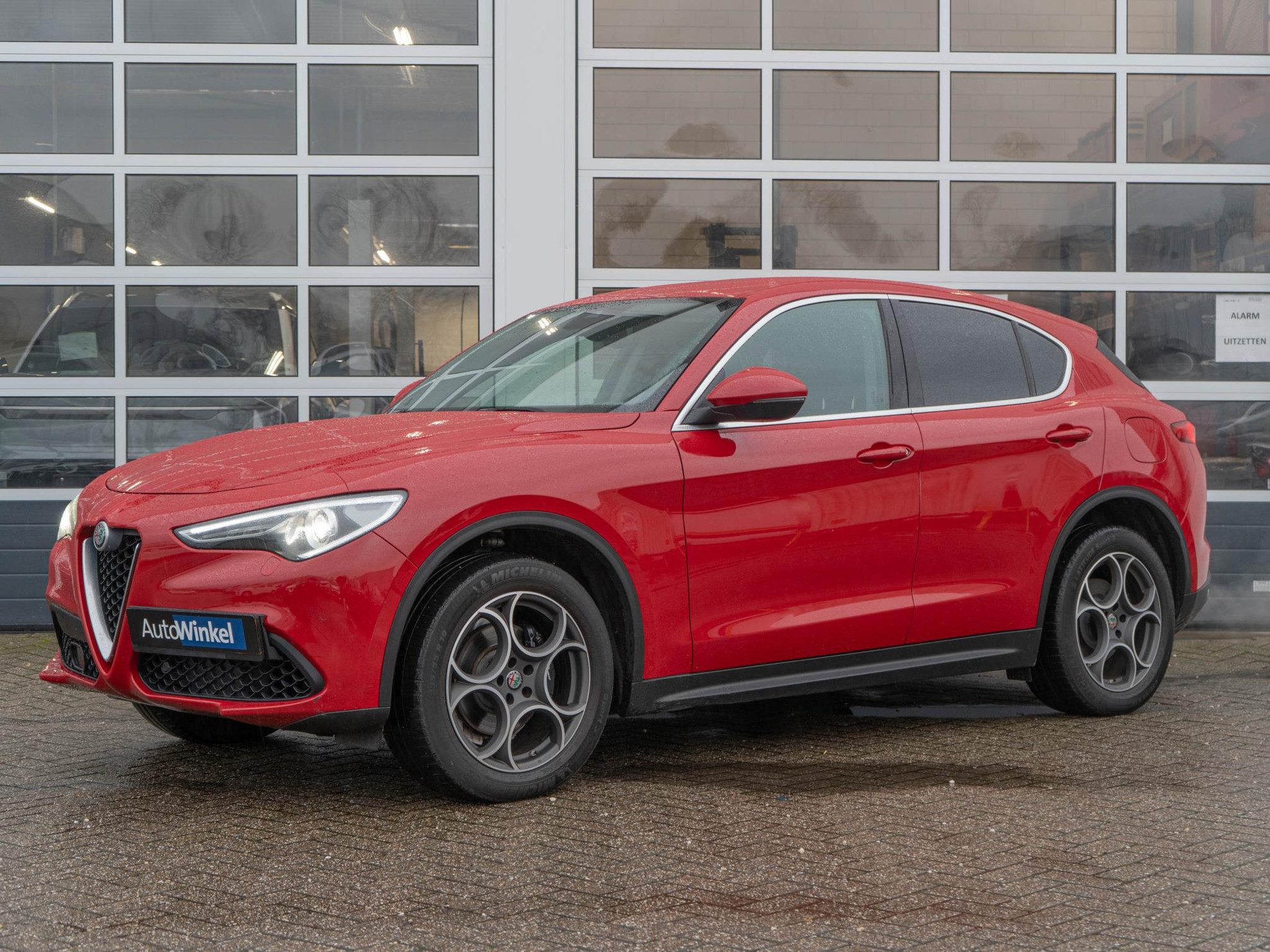 Alfa Romeo Stelvio 2.0 Turbo Aut. AWD 280pk First Edition | Rosso Alfa | 20” LM | Navi | Clima | Stoel-/Stuurverwarming