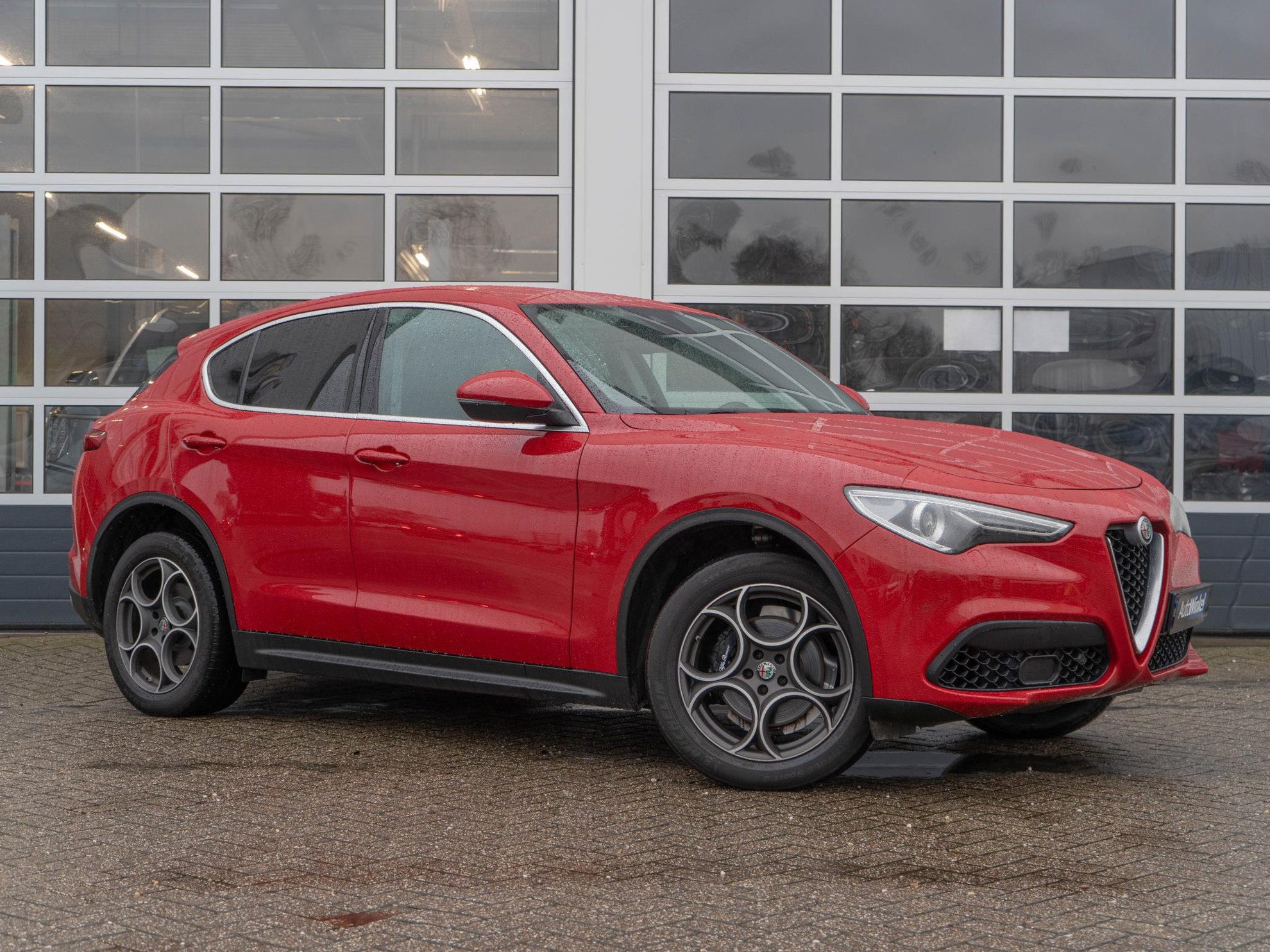 Alfa Romeo Stelvio 2.0 Turbo Aut. AWD 280pk First Edition | Rosso Alfa | 20” LM | Navi | Clima | Stoel-/Stuurverwarming