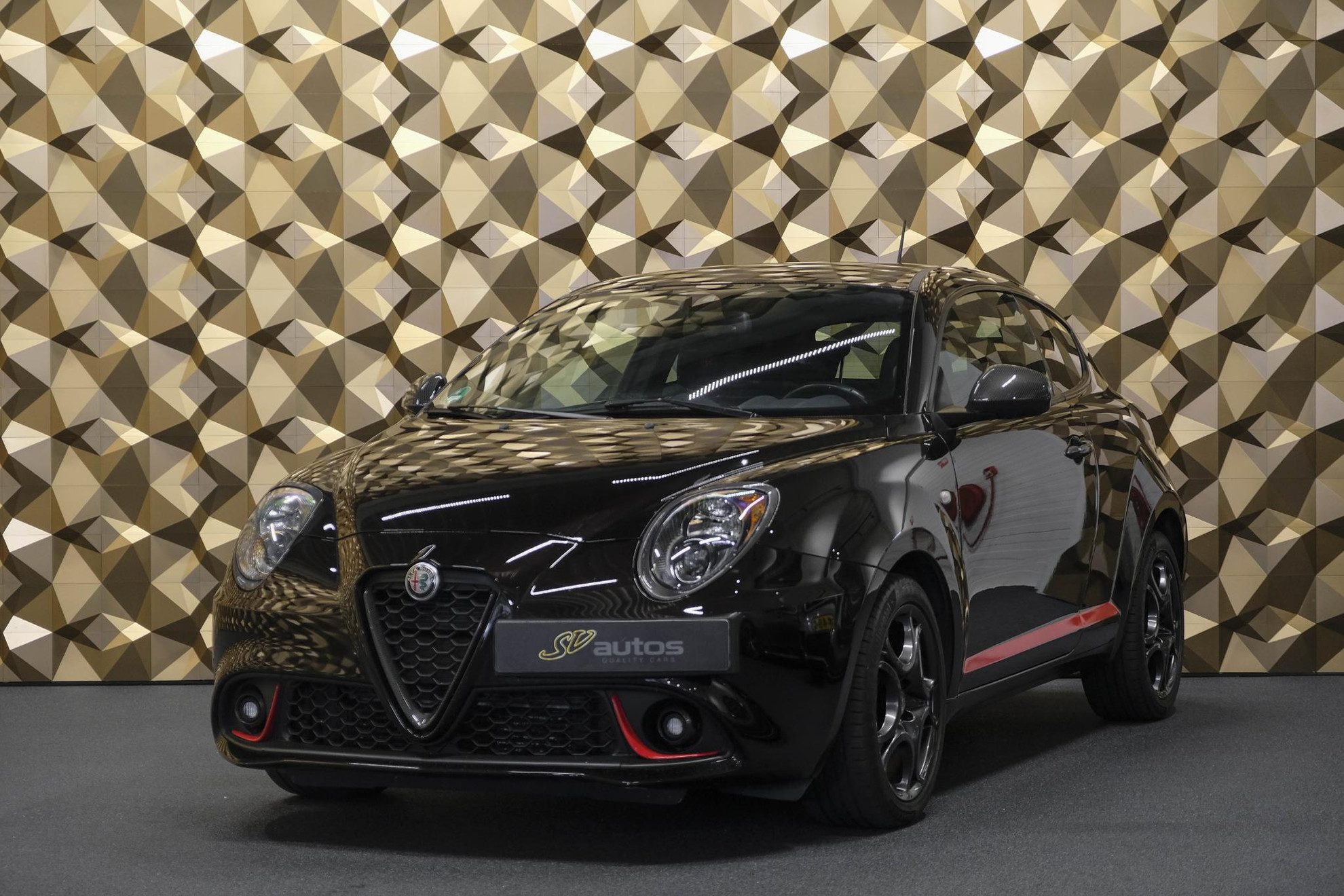 Alfa Romeo MiTo 0.9 TwinAir 100pk Sport Navigatie Clima Cruise Carbon delen 17″ LMV NLauto 1e eigenaar!