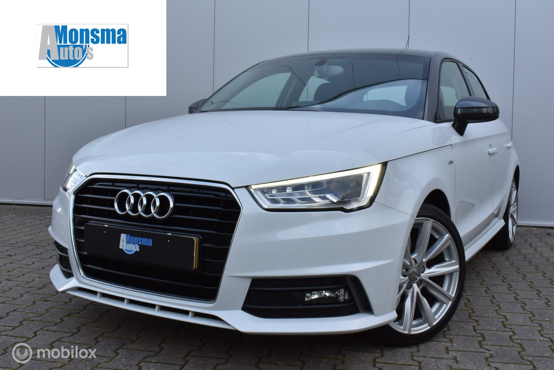 Audi A1 Sportback 1.0 TFSI AUT. S-Line 2016 Airco Cruise Stoelverwarming Navi 17″ LMV PDC LED Etc!