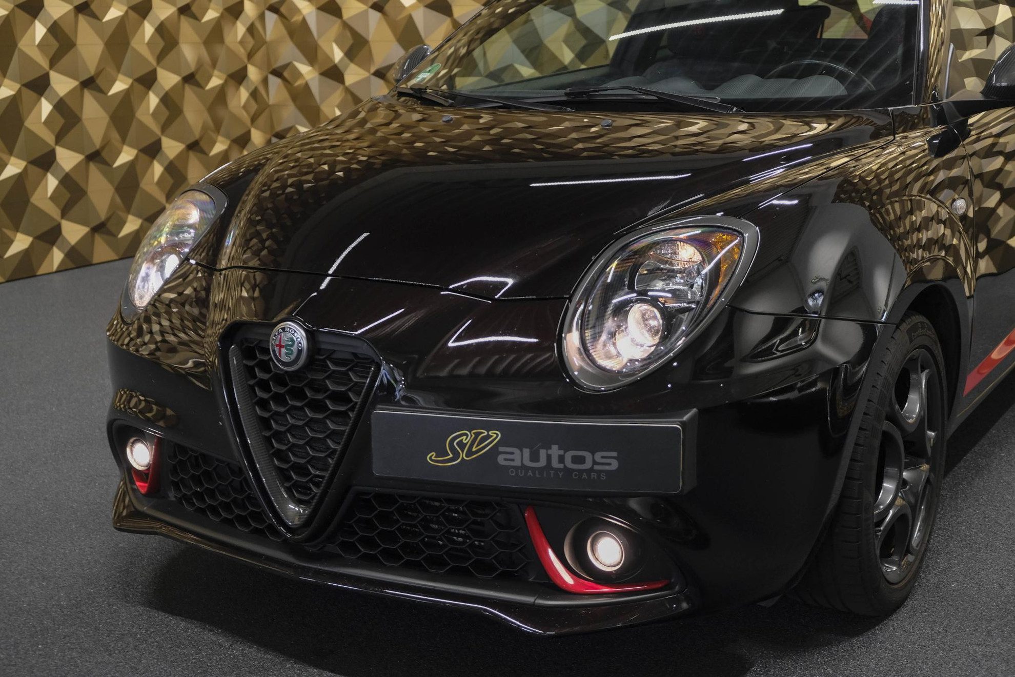 Alfa Romeo MiTo 0.9 TwinAir 100pk Sport Navigatie Clima Cruise Carbon delen 17″ LMV NLauto 1e eigenaar!