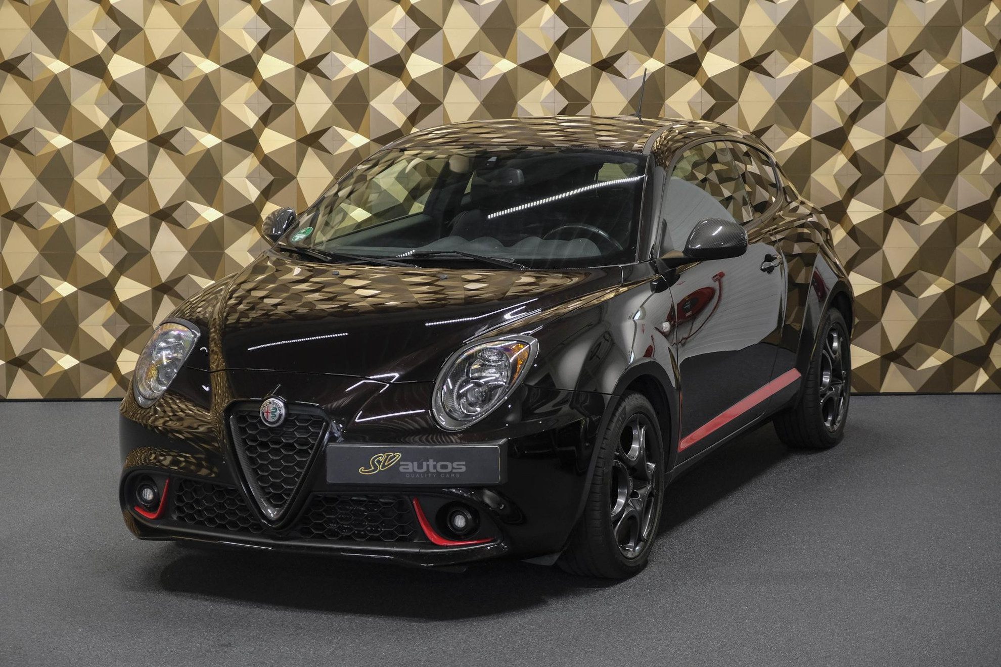 Alfa Romeo MiTo 0.9 TwinAir 100pk Sport Navigatie Clima Cruise Carbon delen 17″ LMV NLauto 1e eigenaar!