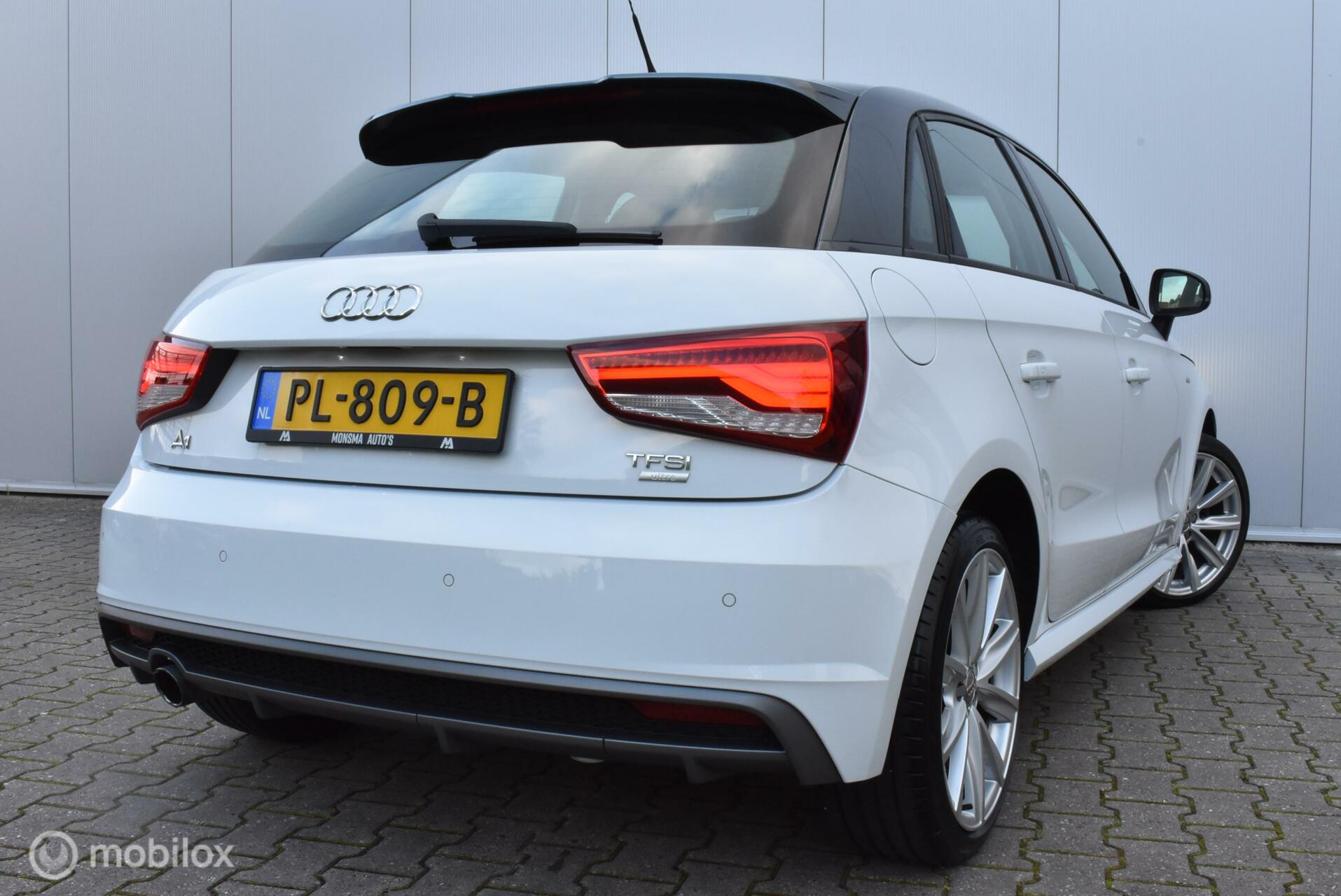 Audi A1 Sportback 1.0 TFSI AUT. S-Line 2016 Airco Cruise Stoelverwarming Navi 17″ LMV PDC LED Etc!