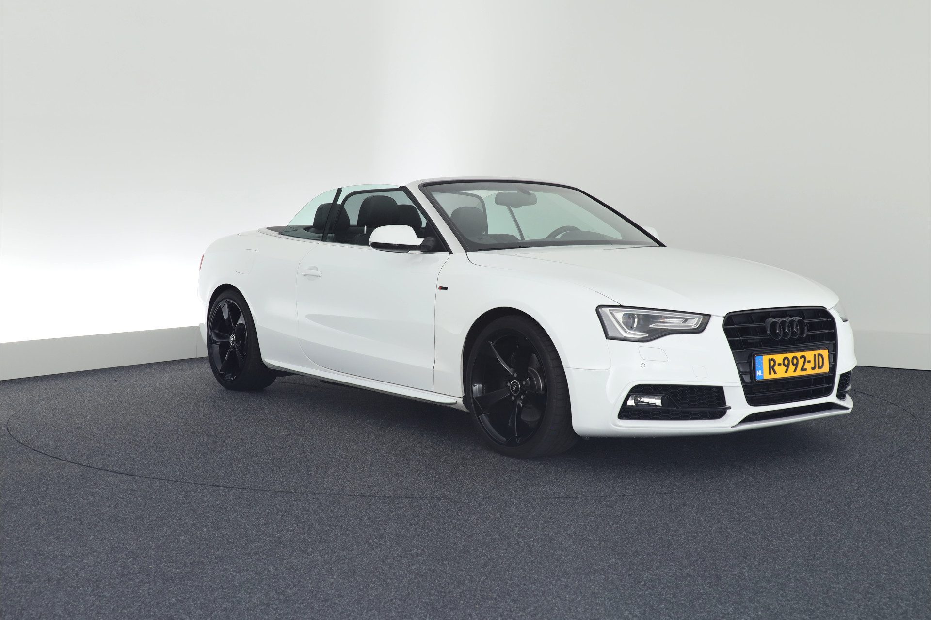 Audi A5 Cabriolet 2.0 TFSI 211pk S-tronic quattro 2x S-Line Nekverwarming Stoelverwarming Keyless Xenon Leder Navigatie