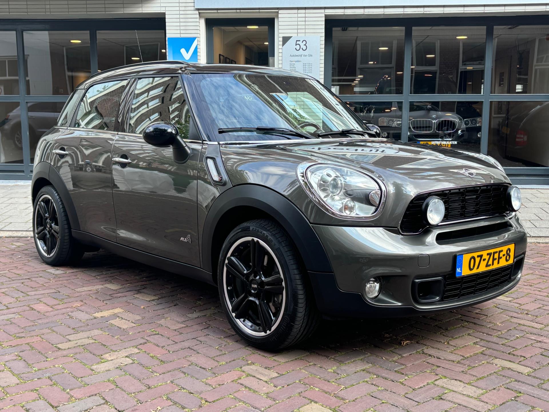 Mini Mini Countryman 1.6 Cooper S ALL4 Chili | AUTOMAAT | KEYLESS ENTRY/GO | LEDER | NAVIGATIE | PANORAMAKDAK |