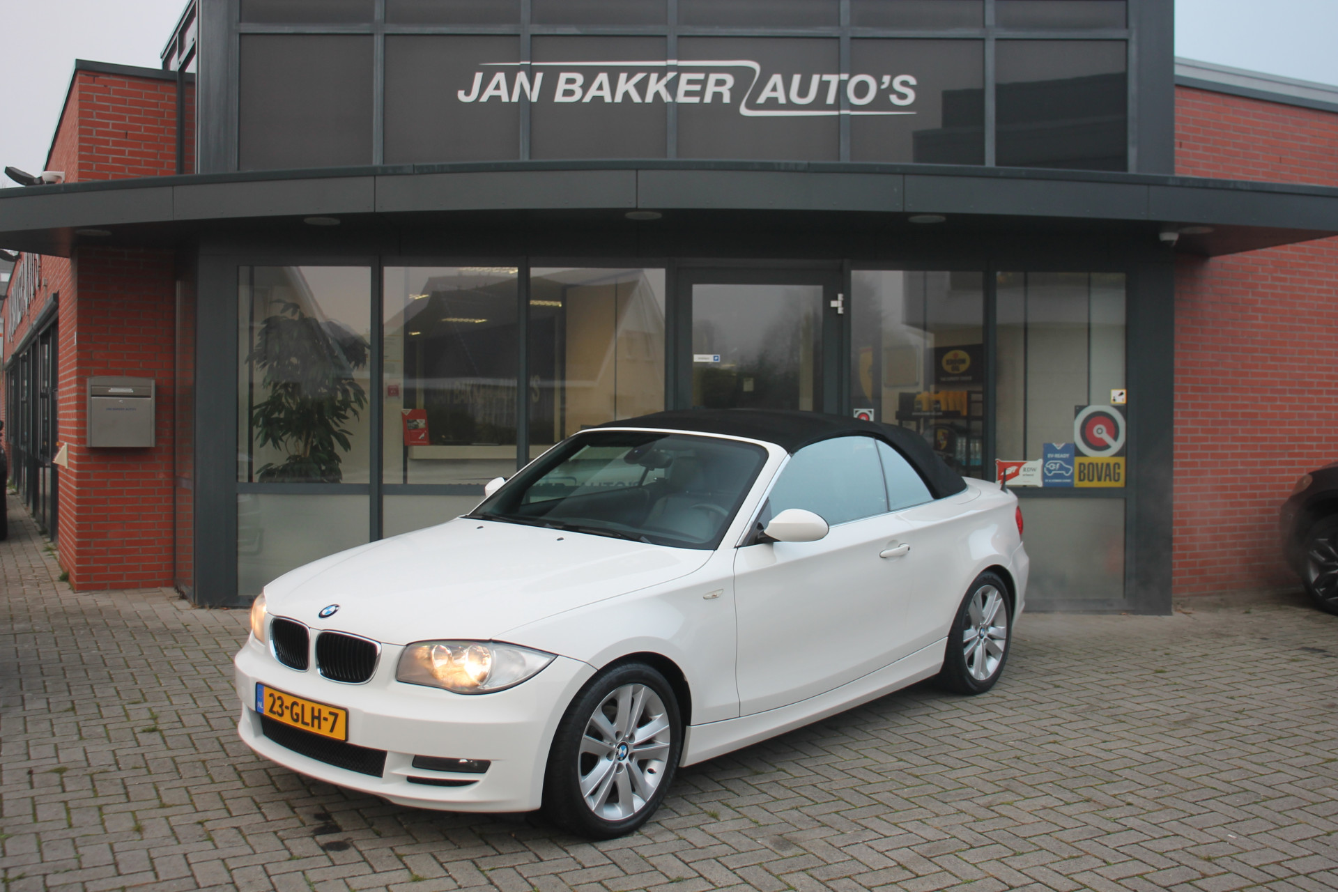 BMW 1 Serie Cabrio 118i High Executive ✅ Leer ✅ NL-auto ✅ NAP ✅ 17inch