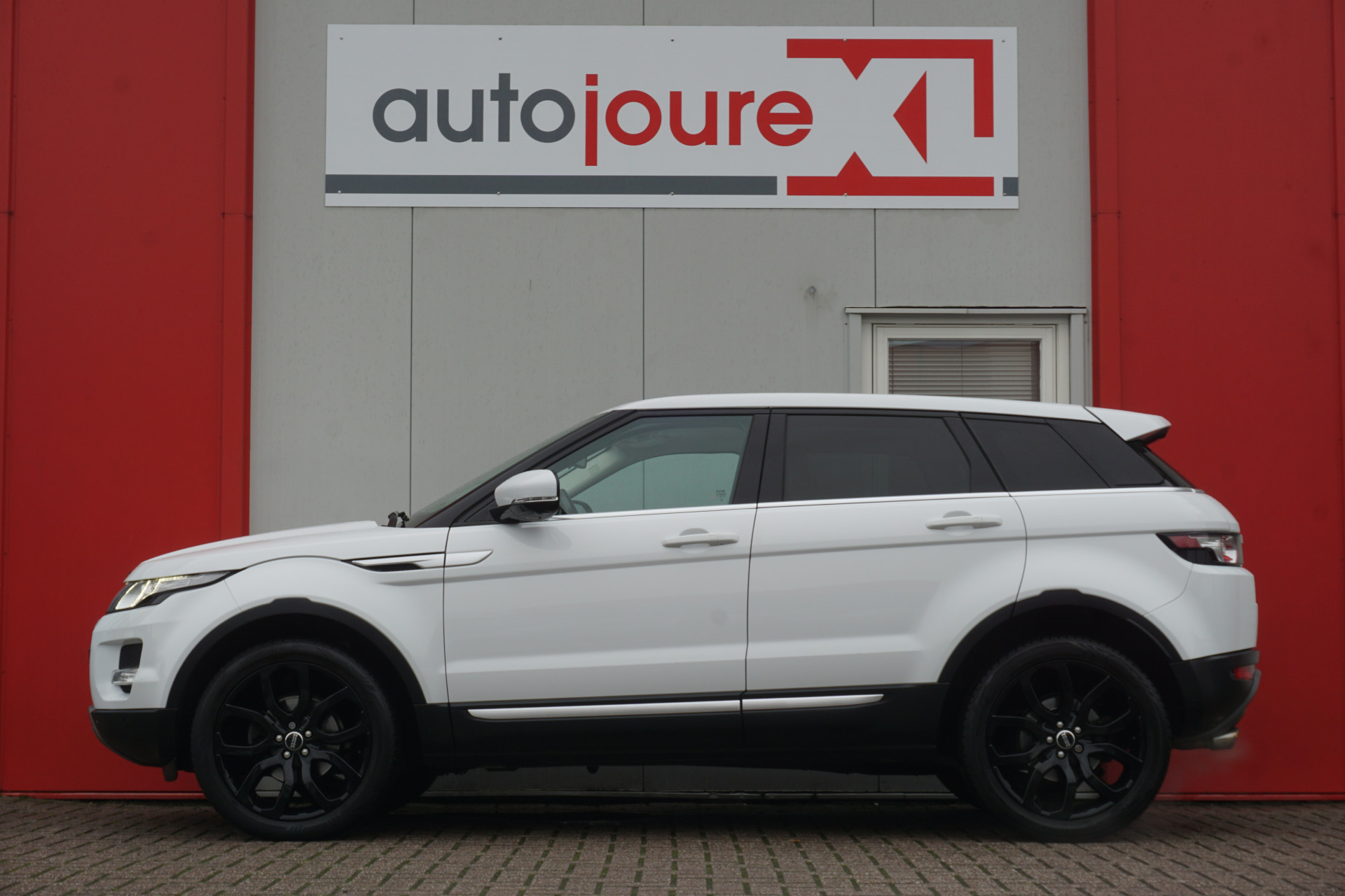 Land Rover Range Rover Evoque 2.0 Si 4WD Prestige | Panoramadak | Leder | Camera | Premium Audio |