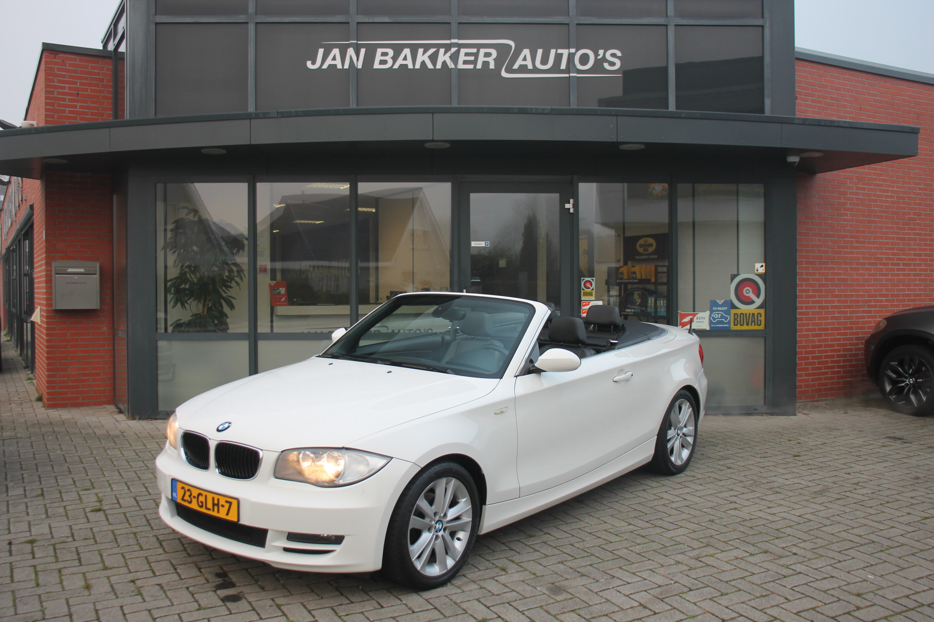 BMW 1 Serie Cabrio 118i High Executive ✅ Leer ✅ NL-auto ✅ NAP ✅ 17inch