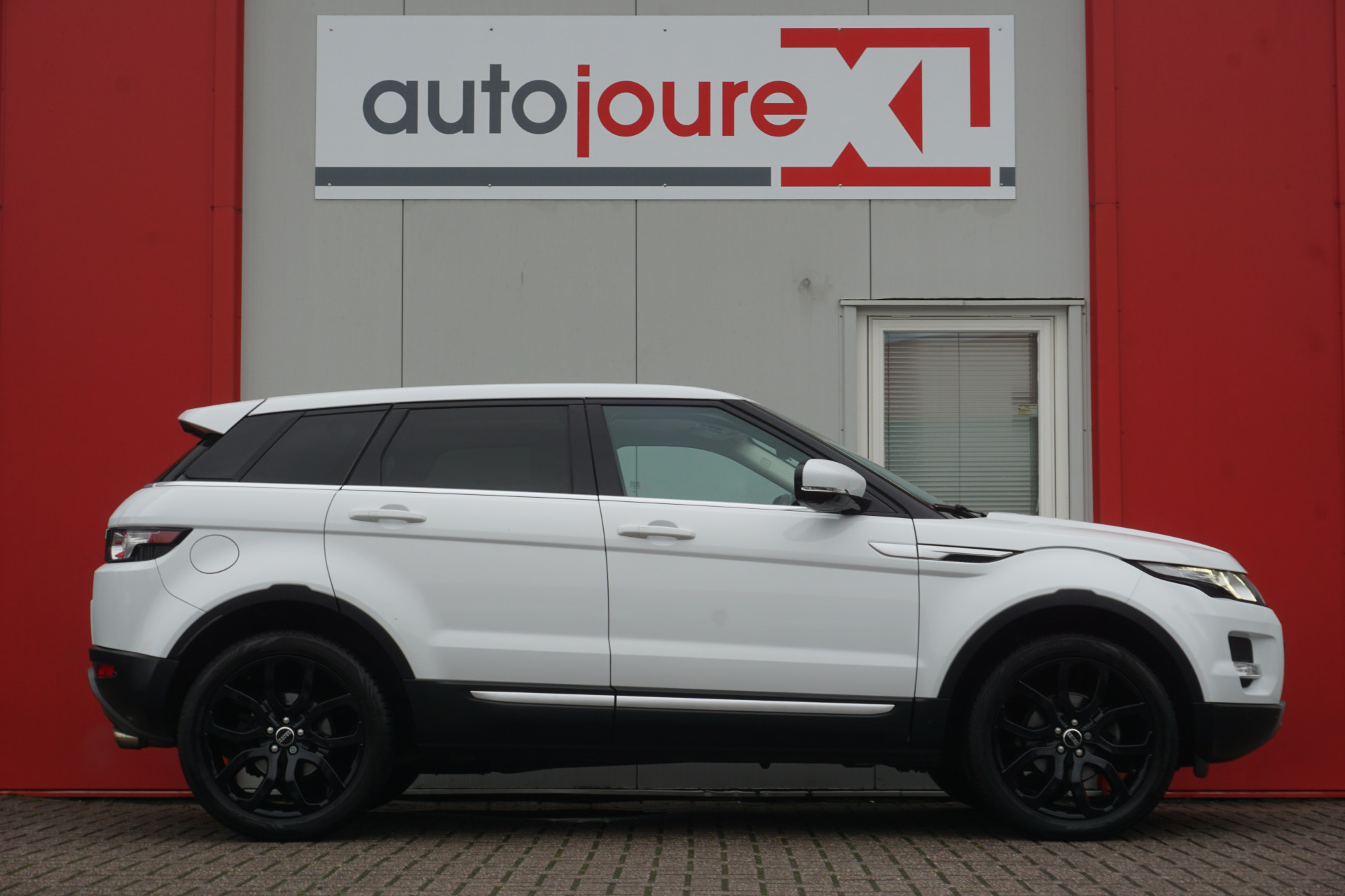 Land Rover Range Rover Evoque 2.0 Si 4WD Prestige | Panoramadak | Leder | Camera | Premium Audio |