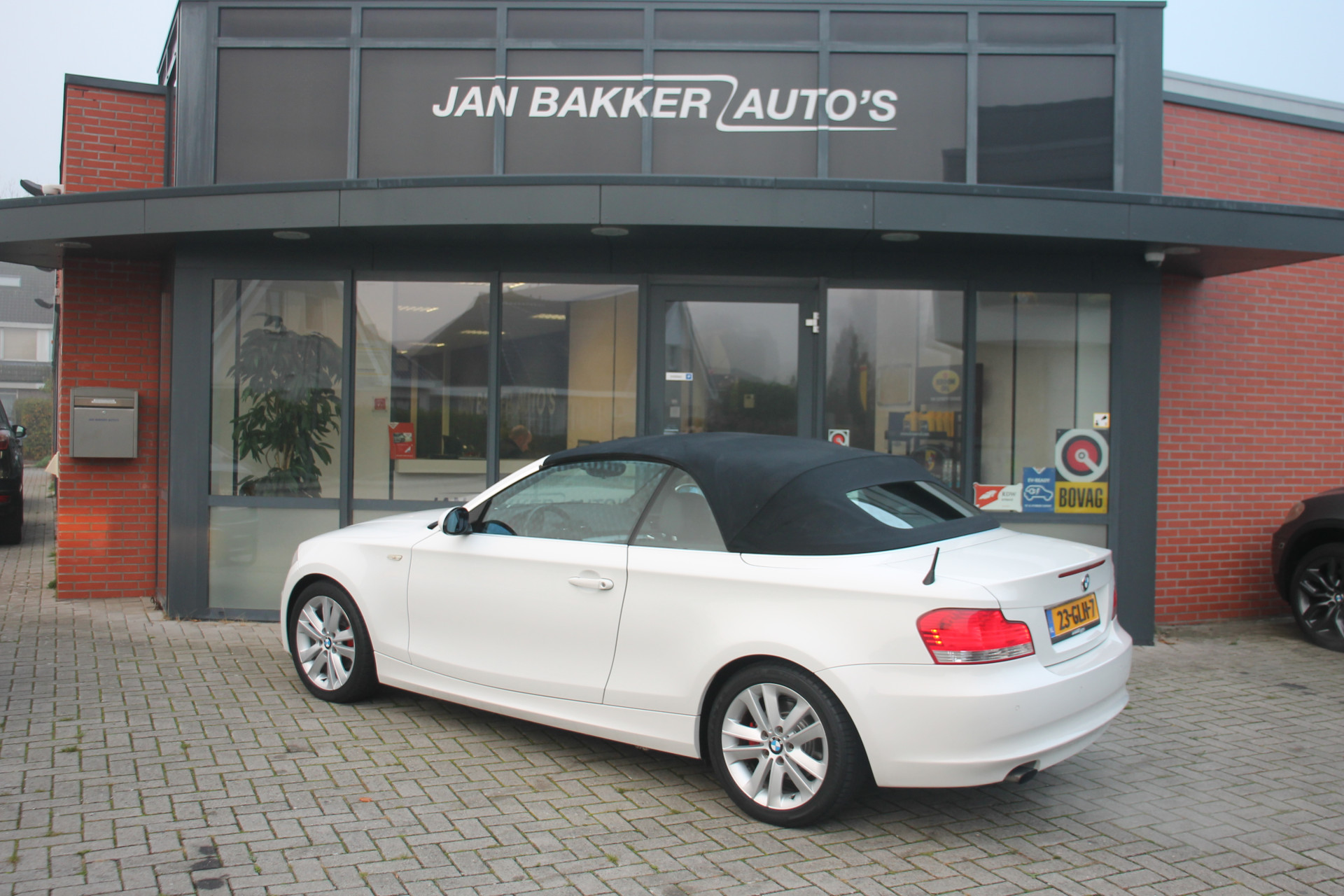 BMW 1 Serie Cabrio 118i High Executive ✅ Leer ✅ NL-auto ✅ NAP ✅ 17inch