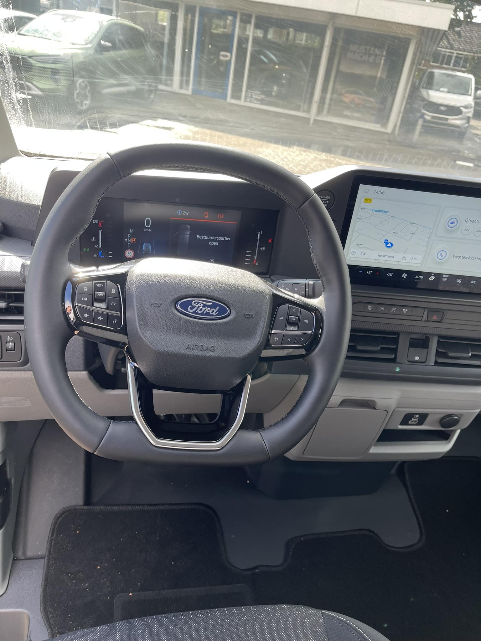 Ford Transit Custom 320 2.0 TDCI L2H1 Trend SCI Automaat 170 pk | Adaptive cruise control | Dubbele schuifdeur | 8-weg bestuurderstoel + passagiersbank | Stoelverwarming | Dodehoeksensoren | Navigatie | Electrische inklapbare spiegels | 16 inch lichtmetalen velgen | Full LED | Dual-zone climate control | LED laadruimteverlichting