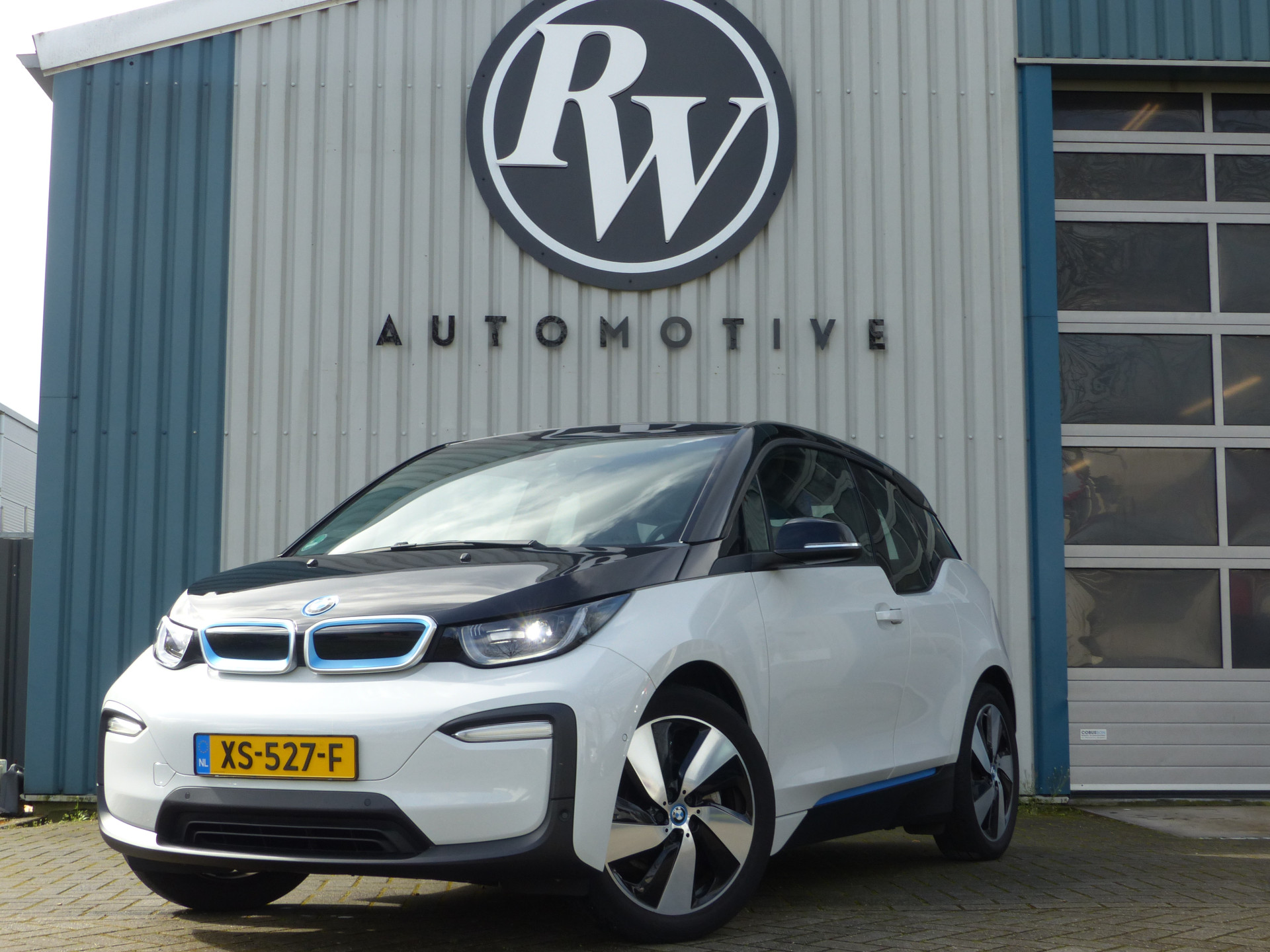 BMW i3 BMW i3 120Ah 42 kWh!! Camera/Warmtepomp/ Ecc/Adaptive Cruise/NL Auto!