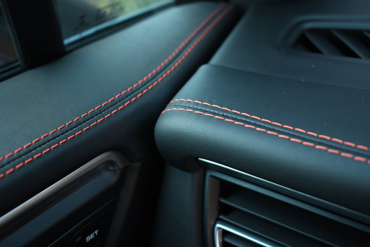 Porsche Macan Porsche Macan T 2.0 PDK Pano Luchtvering ACC Bose Papaya-orange