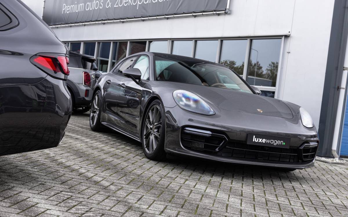 Porsche Macan Porsche Macan T 2.0 PDK Pano Luchtvering ACC Bose Papaya-orange