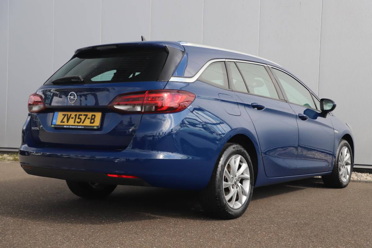 Opel Astra Opel Astra Sports Tourer 1.0 Turbo Business Executive 105PK 16 inch LMV Climate Cruise Control Sportstoelen Navigatie Carplay Android Elektrische Achterklep