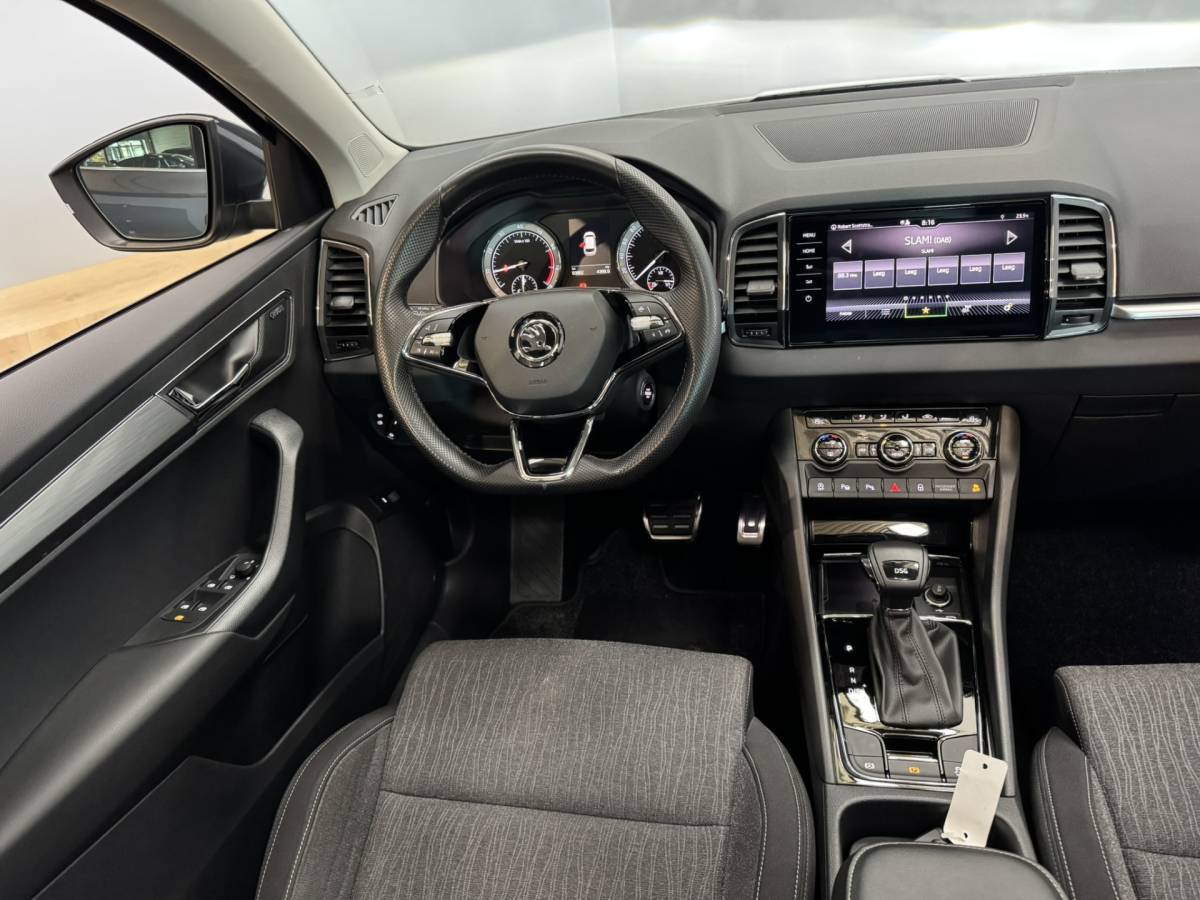 Škoda Karoq ŠKODA Karoq 1.5 TSI ACT Business Edition Plus Airco ECC | Panorama | Trekhaak | Camera | LED | Cruise Control | Canton Audio | Isofix | NAP