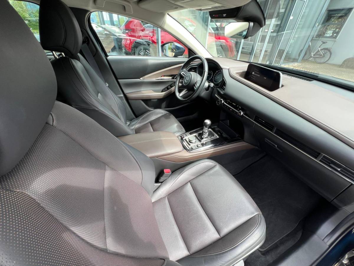 Mazda CX-30 Mazda CX-30 2.0 e-SkyActiv-X M Hybrid Luxury | TREKHAAK | 1E EIG | NED AUTO | LEER | APPLE + ANDROID AUTO | STOEL + STUURVERWARMING | 18INCH |