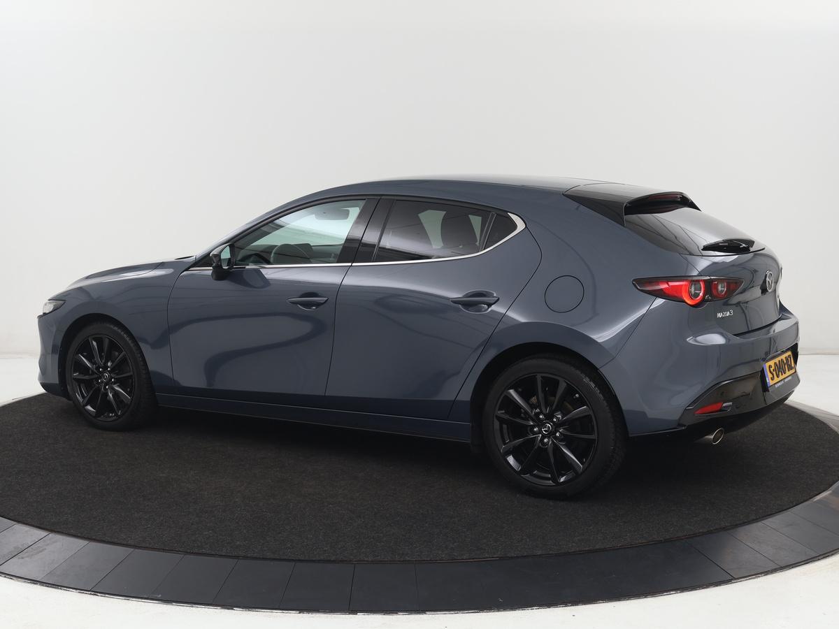 Mazda 3 Mazda 3 2.0 e-SkyActiv-G M Hybrid 150 Homura |  Stoelverwarming | Head-Up | Adaptive cruise | Camera | Carplay | Keyless | Full LED | Navigatie | Dodehoek detectie | 58.800km NAP | Origineel NL