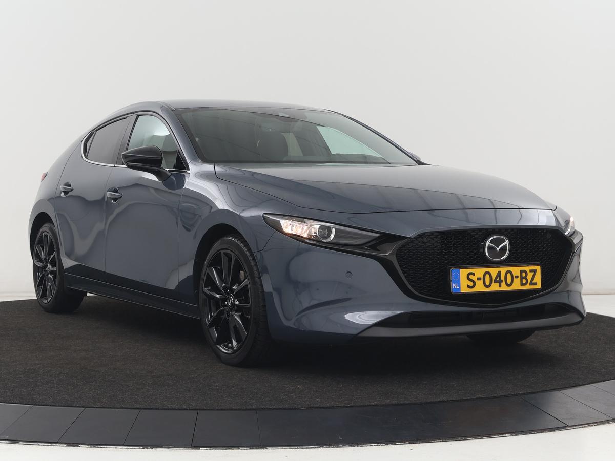 Mazda 3 Mazda 3 2.0 e-SkyActiv-G M Hybrid 150 Homura |  Stoelverwarming | Head-Up | Adaptive cruise | Camera | Carplay | Keyless | Full LED | Navigatie | Dodehoek detectie | 58.800km NAP | Origineel NL