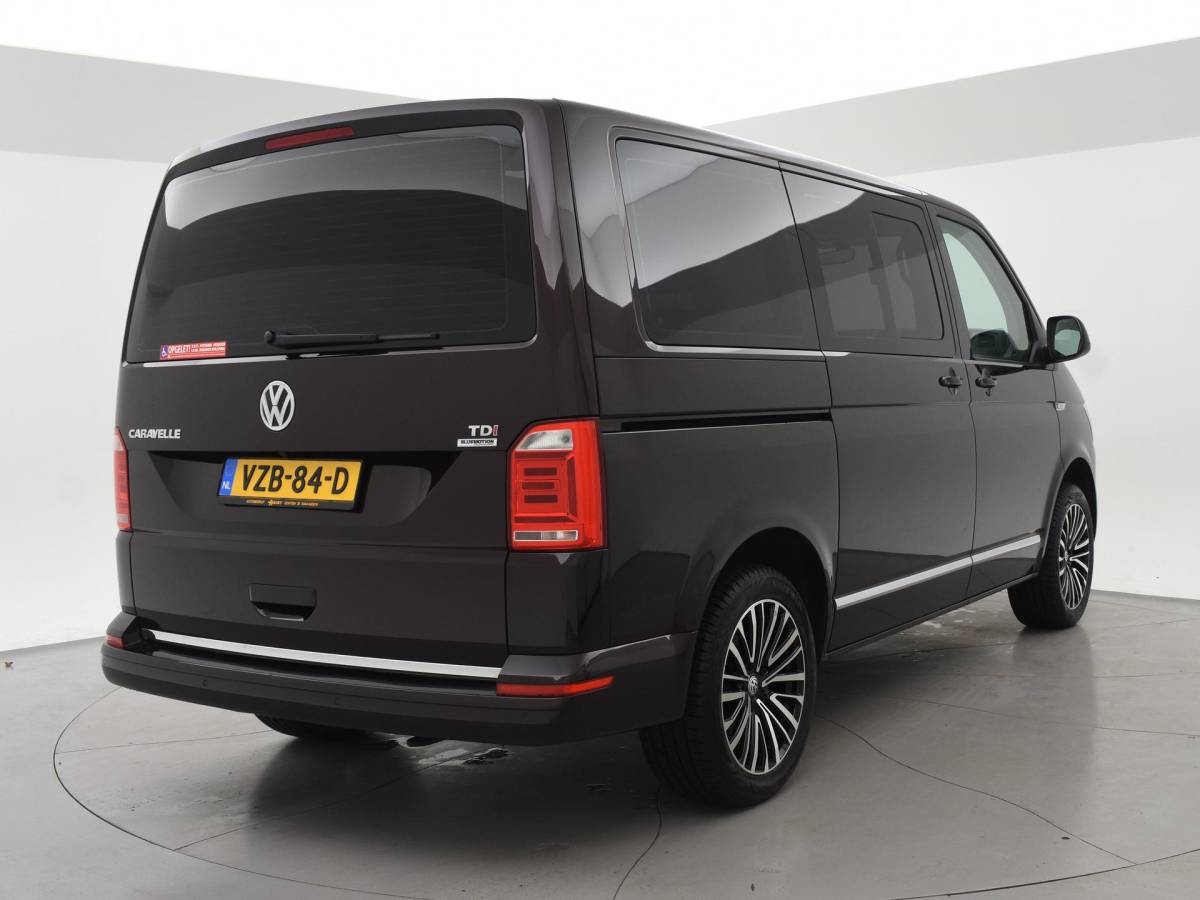 Volkswagen Transporter Volkswagen Transporter CARAVELLE 2.0 TDI DSG ROLSTOEL LIFT EURO 6 + STANDKACHEL | 18 INCH | CAMERA | CARPLAY | LED | STOELVERW.
