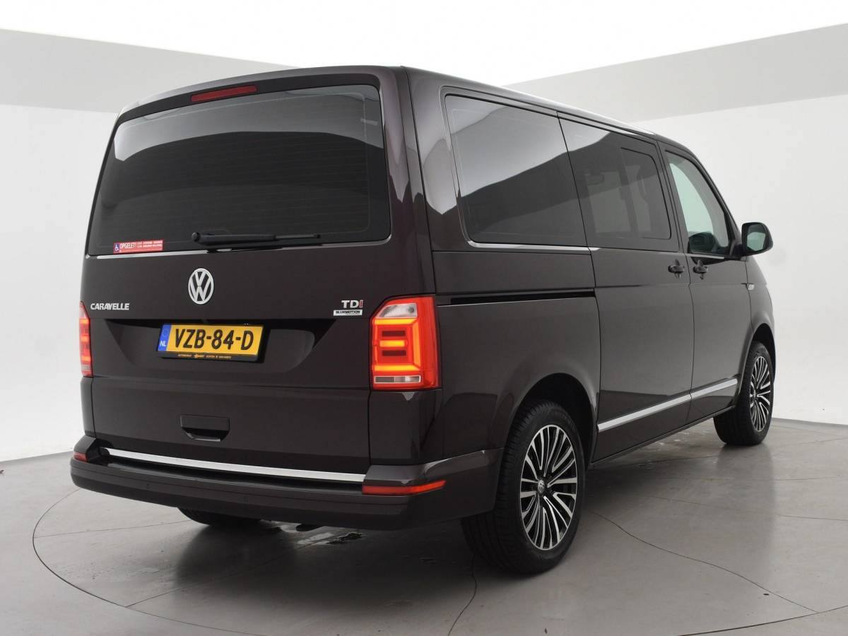 Volkswagen Transporter Volkswagen Transporter CARAVELLE 2.0 TDI DSG ROLSTOEL LIFT EURO 6 + STANDKACHEL | 18 INCH | CAMERA | CARPLAY | LED | STOELVERW.