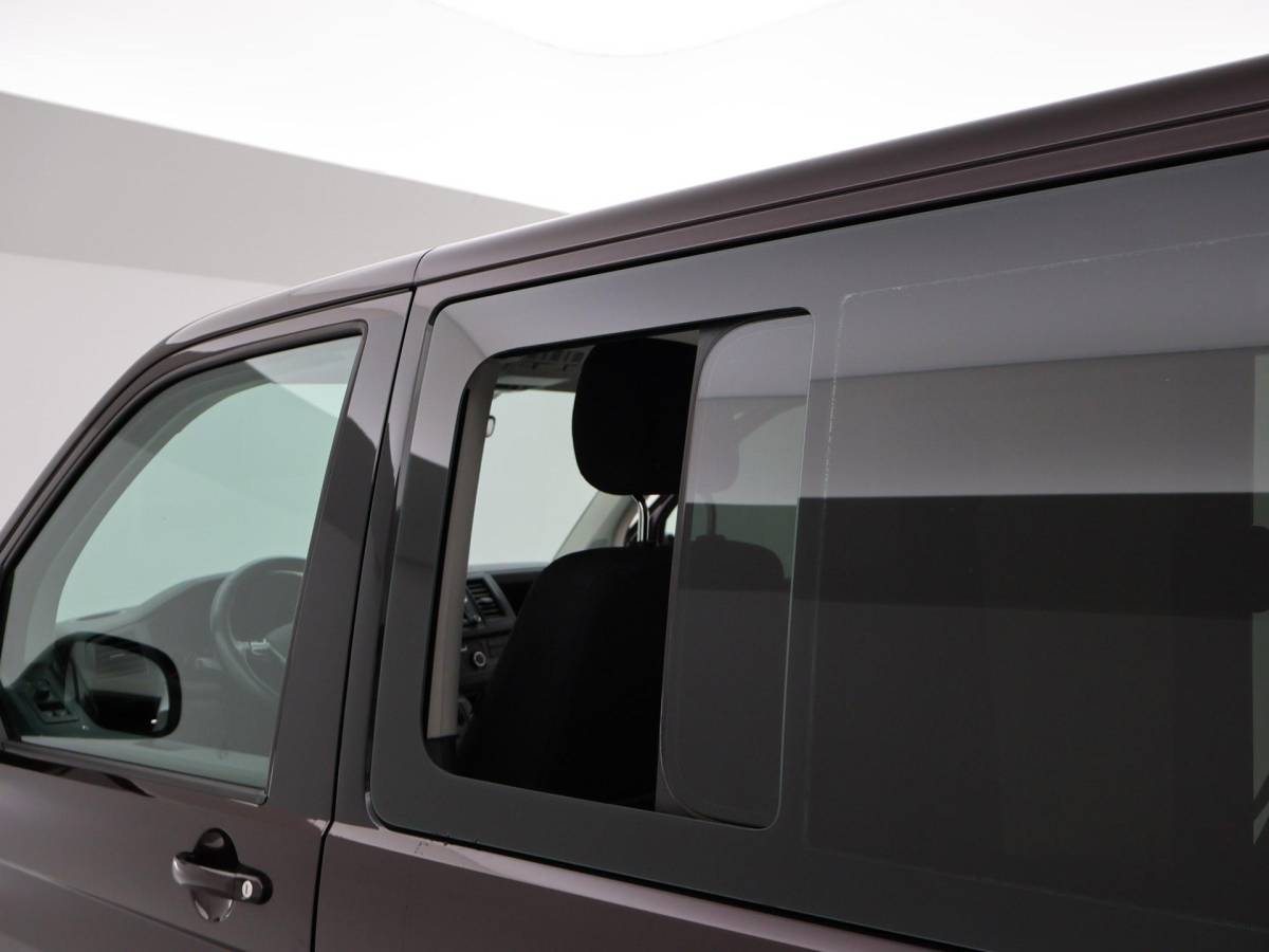 Volkswagen Transporter Volkswagen Transporter CARAVELLE 2.0 TDI DSG ROLSTOEL LIFT EURO 6 + STANDKACHEL | 18 INCH | CAMERA | CARPLAY | LED | STOELVERW.