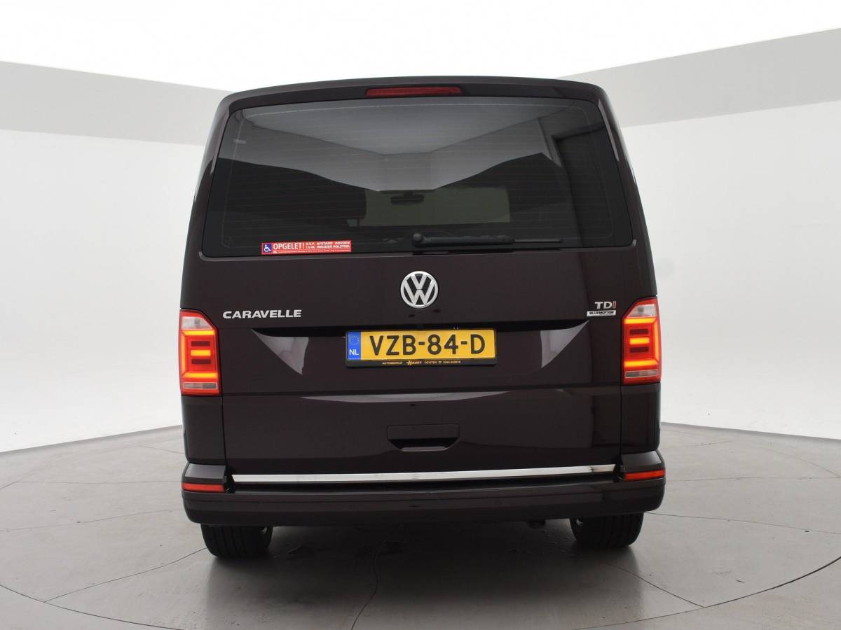 Volkswagen Transporter Volkswagen Transporter CARAVELLE 2.0 TDI DSG ROLSTOEL LIFT EURO 6 + STANDKACHEL | 18 INCH | CAMERA | CARPLAY | LED | STOELVERW.