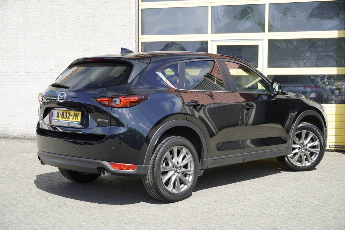 Mazda CX-5 Mazda CX-5 2.0 SkyActiv-G 165PK! Automaat Style Selected BJ2021 Lmv 19″ | Led V+A | Pdc | Keyless entry | 360° Camera |  Bose Audio | Head-up display | Climate control | Cruise control | Elek voorstoelen | Lederen bekleding | Verwarmd stuur | Verwarmde voorstoelen