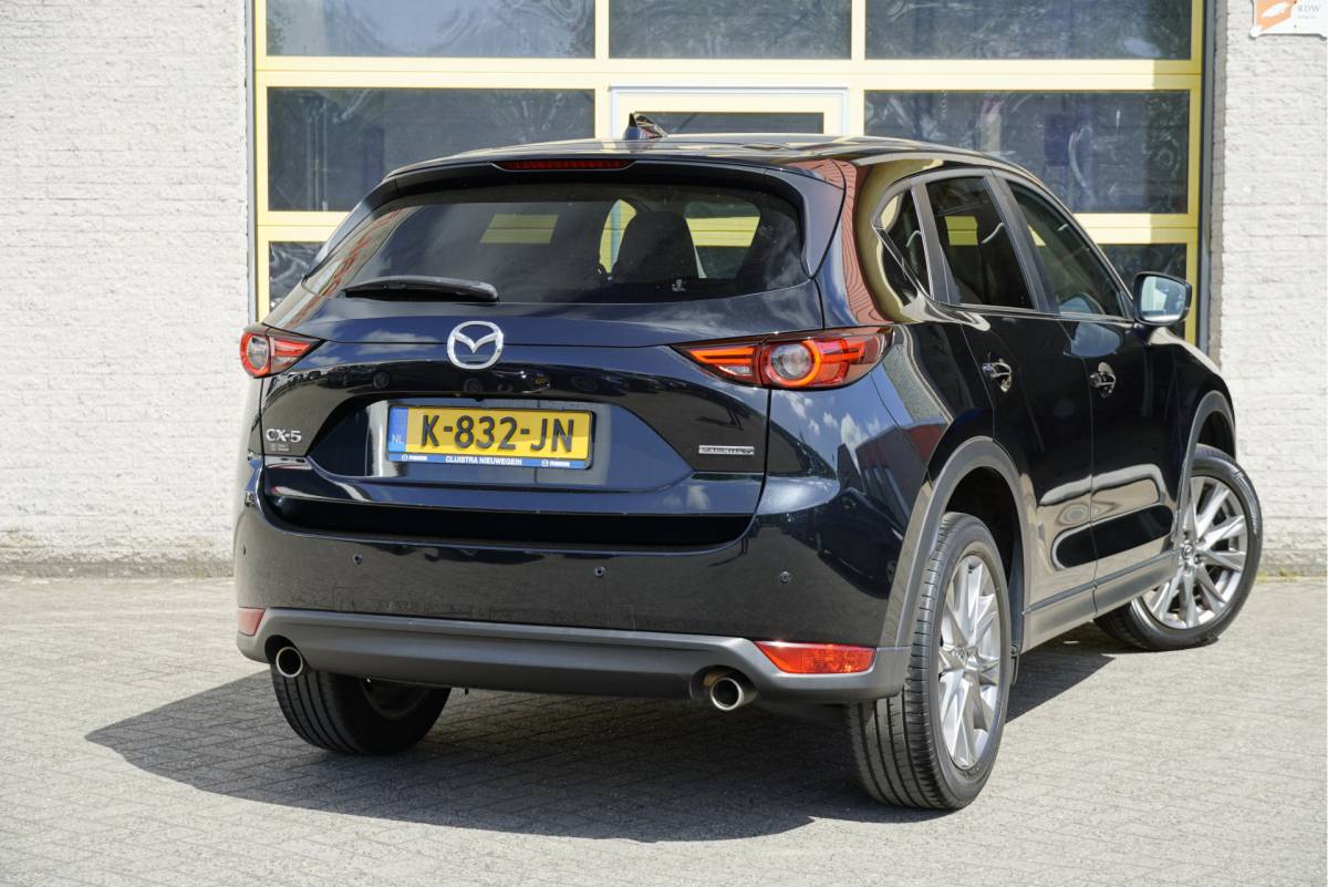 Mazda CX-5 Mazda CX-5 2.0 SkyActiv-G 165PK! Automaat Style Selected BJ2021 Lmv 19″ | Led V+A | Pdc | Keyless entry | 360° Camera |  Bose Audio | Head-up display | Climate control | Cruise control | Elek voorstoelen | Lederen bekleding | Verwarmd stuur | Verwarmde voorstoelen