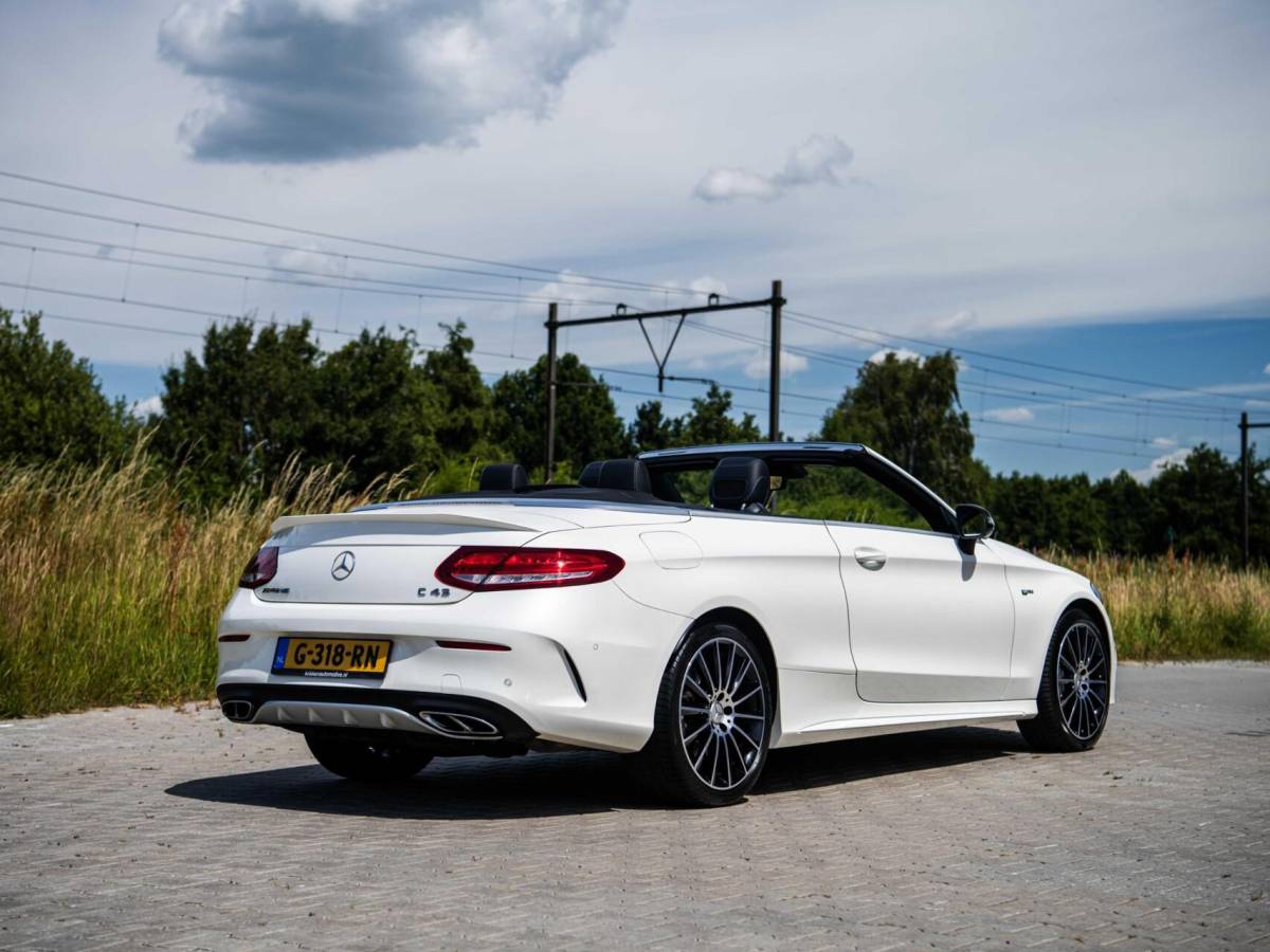 Mercedes-Benz C-Klasse Mercedes C-klasse Cabrio C43 AMG 367PK Speedshift 4MATIC Burmester Stoelkoeling Airscarf Sportuitlaat Memory