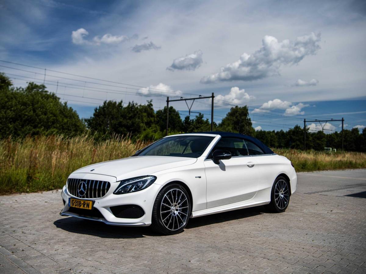 Mercedes-Benz C-Klasse Mercedes C-klasse Cabrio C43 AMG 367PK Speedshift 4MATIC Burmester Stoelkoeling Airscarf Sportuitlaat Memory