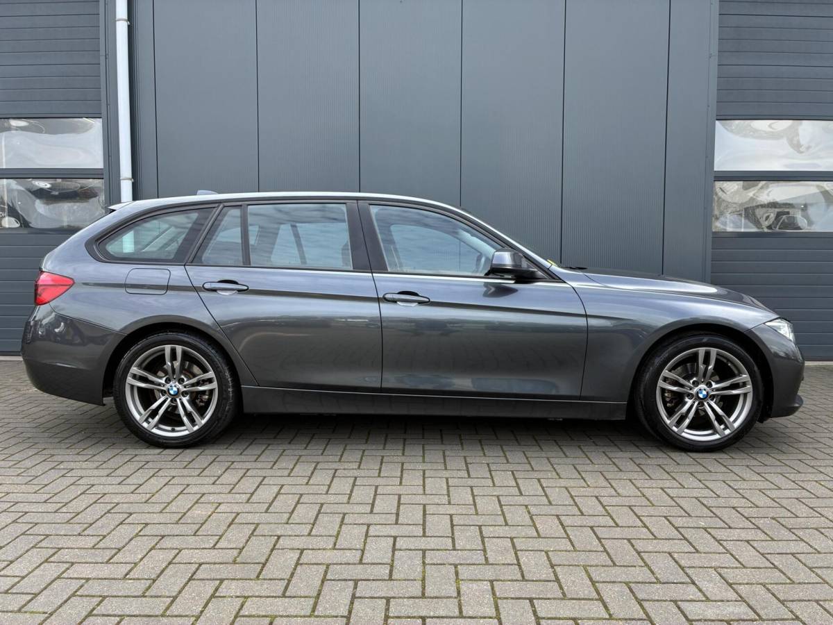 BMW 3 Serie BMW 3-serie Touring 318d | CLIMA | NAVI | STOELVERWARMING