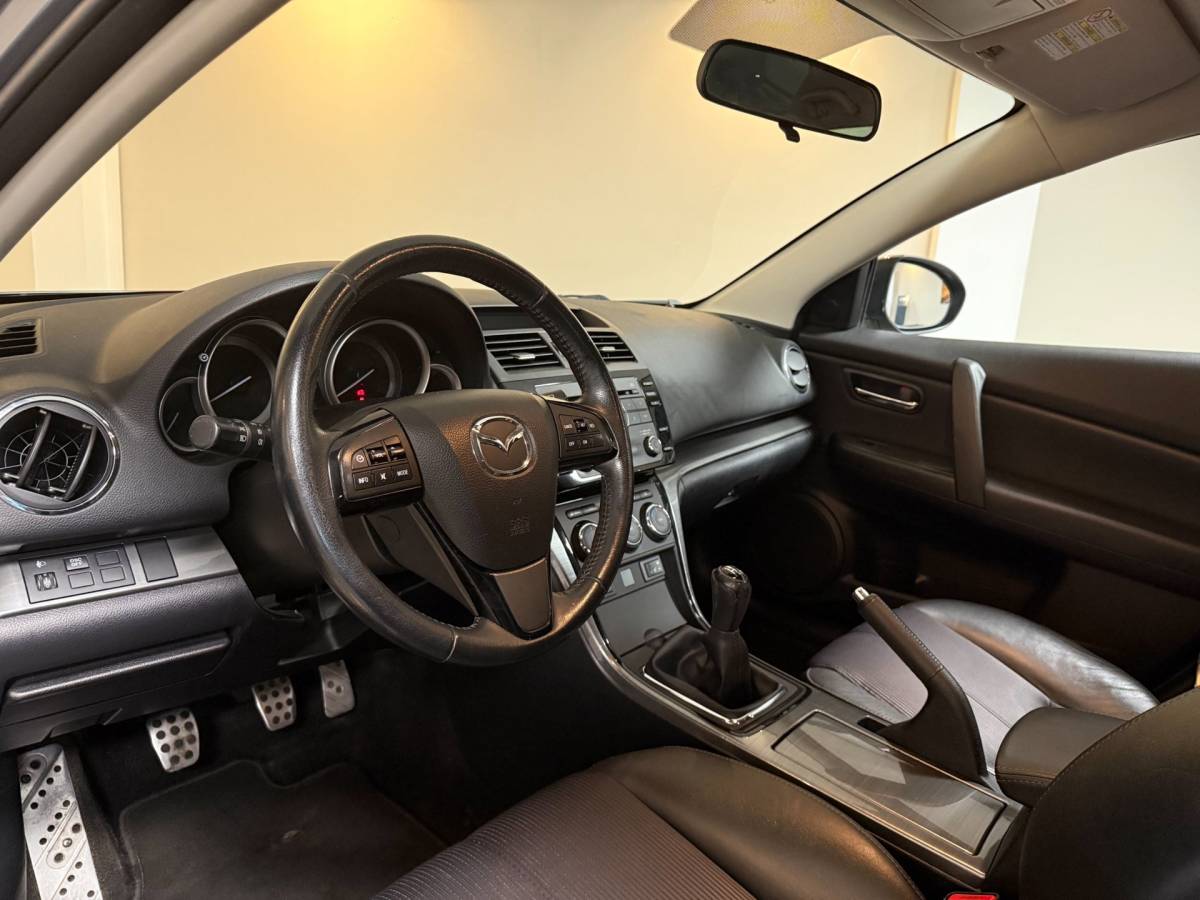 Mazda 6 Mazda 6 Sportbreak 1.8 Exclusive GT *Top onderhouden!* All-season|Stoelverw.|Cruise|PDC|NAP