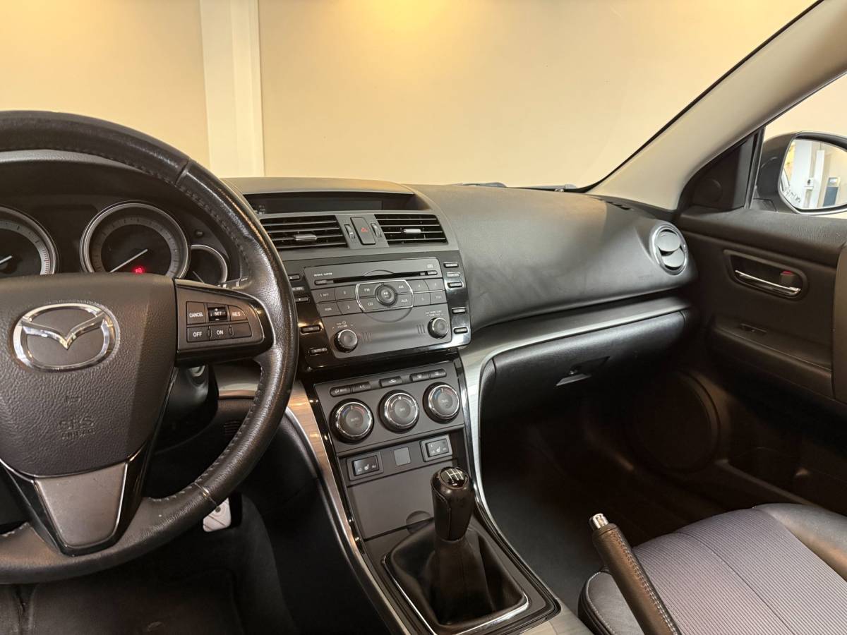 Mazda 6 Mazda 6 Sportbreak 1.8 Exclusive GT *Top onderhouden!* All-season|Stoelverw.|Cruise|PDC|NAP