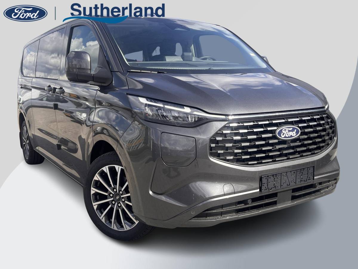 Ford Tourneo Custom Ford Tourneo Custom 340 2.5 PHEV L2H1 Titanium X 233pk ZUID | 16-weg elek. AGR-stoel | Handsfree elek. dubbele zijschuifdeuren | Panoramadak | 15 B&O speaker | Inklapbare trekhaak | Verwarmbaar stuurwiel | Verwarmbare en elek. verstelbare stoelen tweede zitrij | Draadloos opladen | Prijs ex. BTW incl. BPM |  Prijs Incl. BTW en BPM 70.400