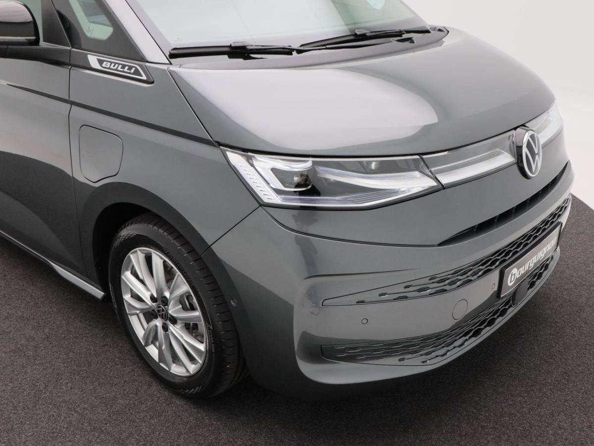 Volkswagen Multivan Volkswagen Bedrijfswagens Multivan Bulli L2 1.5 eHybrid EU6 180 kW/245pk DSG 4Motion | Incl BTW/BPM | 7 zitplaatsen vis-a-vis | Trekhaak | Stoelverwarming | Verlaagd onderstel dynamisch | 19″ Halmstad lichtmetaal  l Wordt verwacht 2 maart |