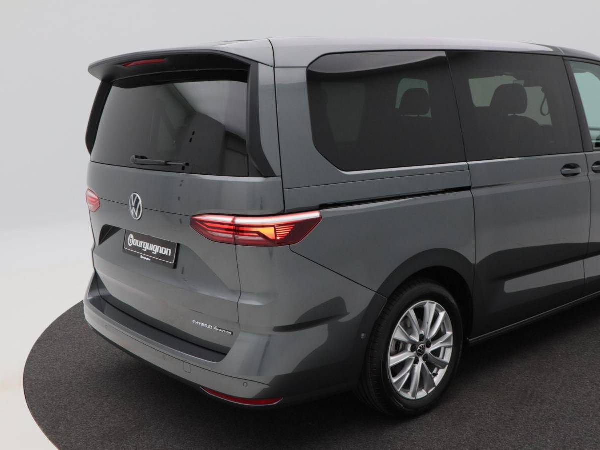 Volkswagen Multivan Volkswagen Bedrijfswagens Multivan Bulli L2 1.5 eHybrid EU6 180 kW/245pk DSG 4Motion | Incl BTW/BPM | 7 zitplaatsen vis-a-vis | Trekhaak | Stoelverwarming | Verlaagd onderstel dynamisch | 19″ Halmstad lichtmetaal  l Wordt verwacht 2 maart |