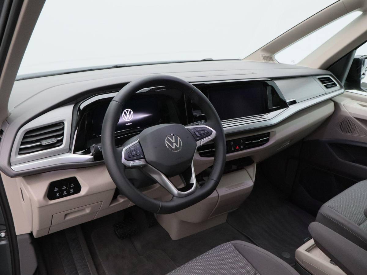 Volkswagen Multivan Volkswagen Bedrijfswagens Multivan Bulli L2 1.5 eHybrid EU6 180 kW/245pk DSG 4Motion | Incl BTW/BPM | 7 zitplaatsen vis-a-vis | Trekhaak | Stoelverwarming | Verlaagd onderstel dynamisch | 19″ Halmstad lichtmetaal  l Wordt verwacht 2 maart |