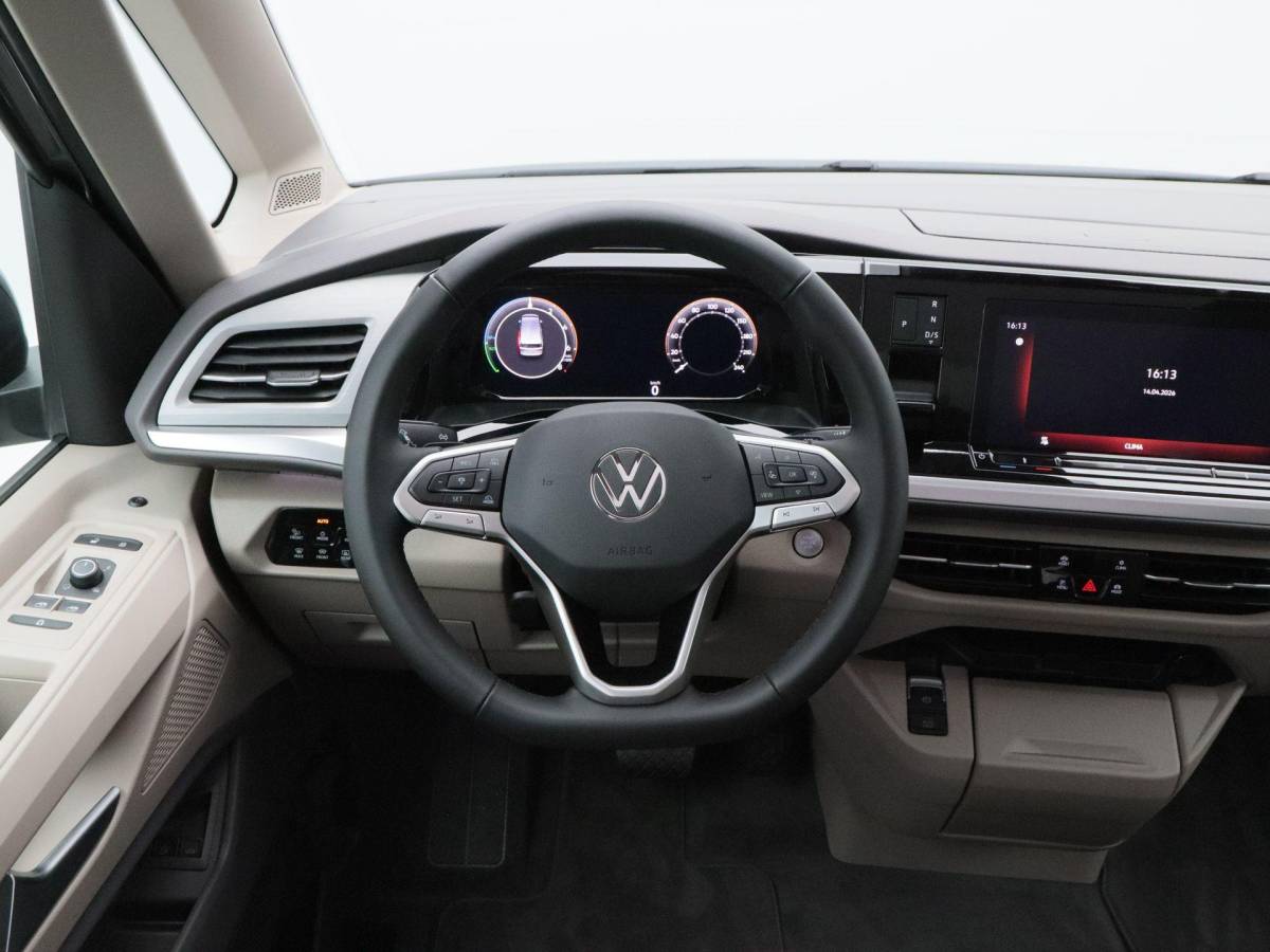 Volkswagen Multivan Volkswagen Bedrijfswagens Multivan Bulli L2 1.5 eHybrid EU6 180 kW/245pk DSG 4Motion | Incl BTW/BPM | 7 zitplaatsen vis-a-vis | Trekhaak | Stoelverwarming | Verlaagd onderstel dynamisch | 19″ Halmstad lichtmetaal  l Wordt verwacht 2 maart |