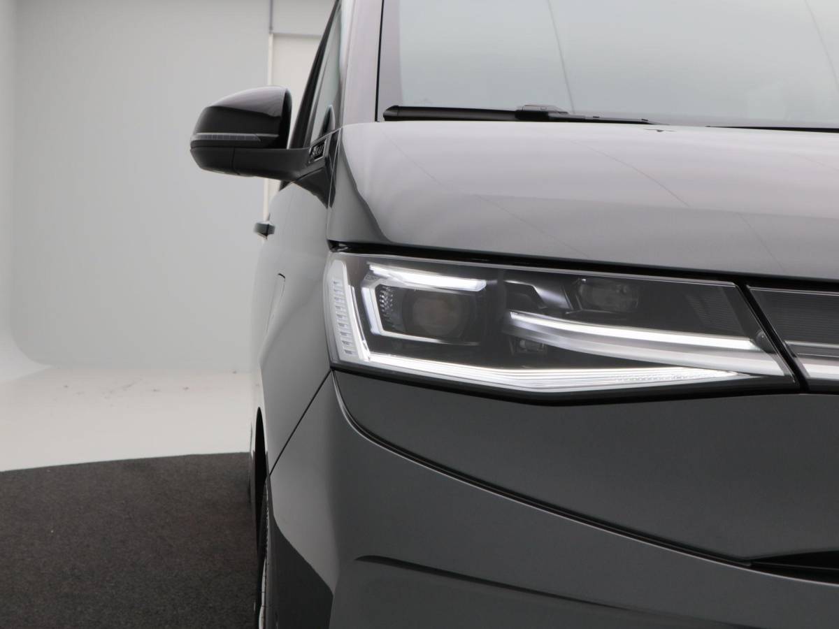 Volkswagen Multivan Volkswagen Bedrijfswagens Multivan Bulli L2 1.5 eHybrid EU6 180 kW/245pk DSG 4Motion | Incl BTW/BPM | 7 zitplaatsen vis-a-vis | Trekhaak | Stoelverwarming | Verlaagd onderstel dynamisch | 19″ Halmstad lichtmetaal  l Wordt verwacht 2 maart |
