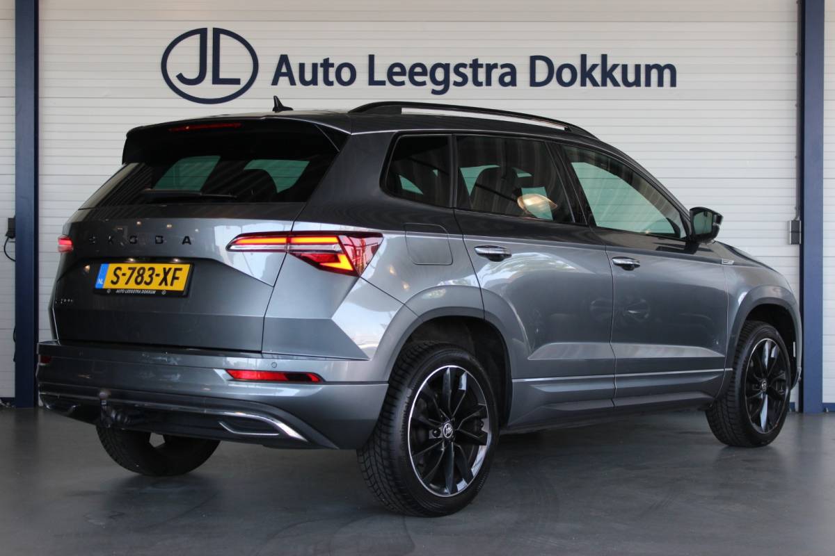 Škoda Karoq ŠKODA Karoq 1.5 TSI ACT Sportline Business Facelift | Trekhaak | Camera | Keyless | Adapt. Cruise | Stoel/Stuurverw. | Virtual Cockpit | Carplay | 18″ LMV | PDC V+A