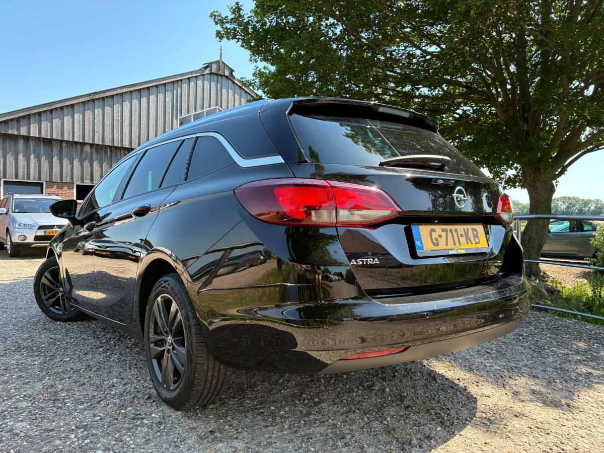 Opel Astra Opel Astra Sports Tourer 1.0 Turbo 120 Jaar Edition | Navi + Clima + Cruise nu €7.975,-!!