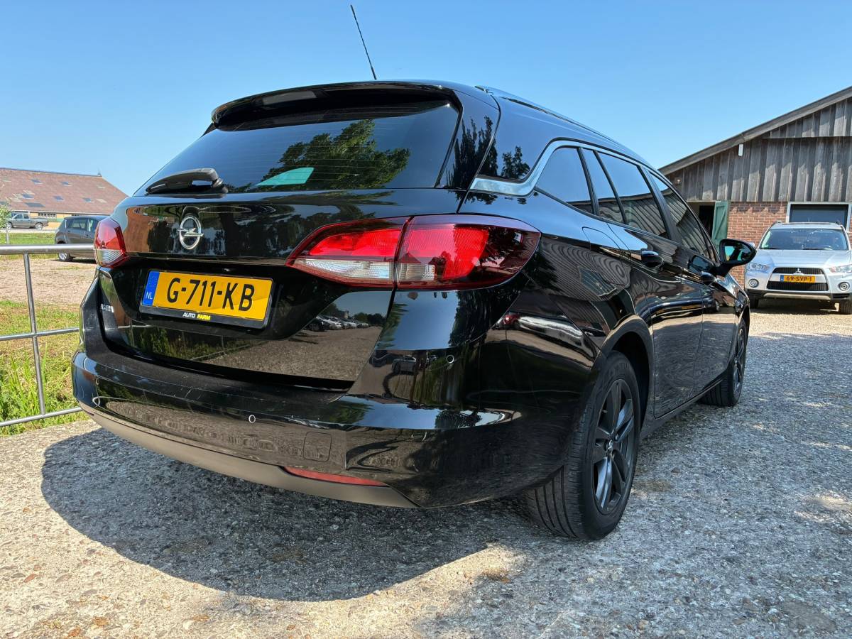 Opel Astra Opel Astra Sports Tourer 1.0 Turbo 120 Jaar Edition | Navi + Clima + Cruise nu €7.975,-!!