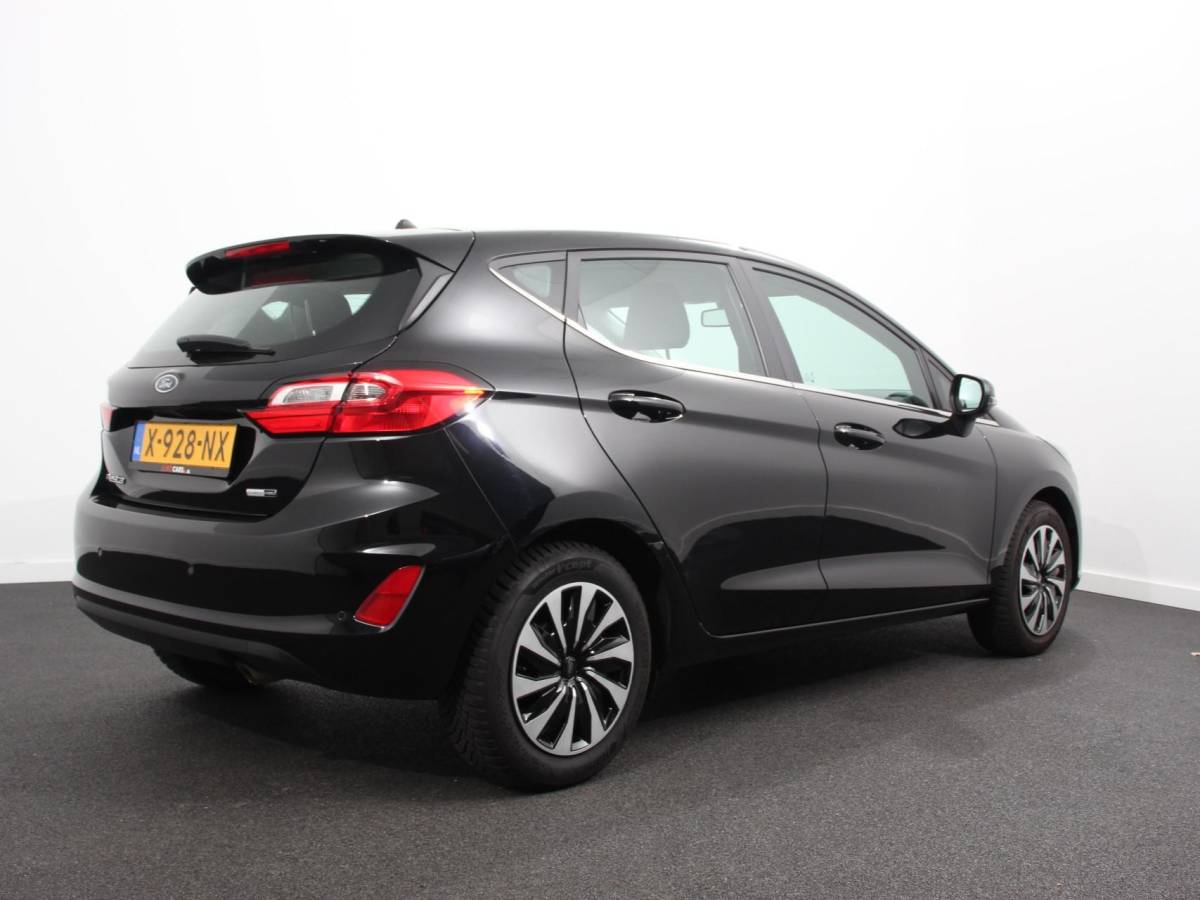 Ford Fiesta Ford Fiesta 1.0 125pk Titanium Navigatie Climate control Led Parkeer sensoren Lichtmetalen velgen Cruise Control Stoelverwarming Bluetooth