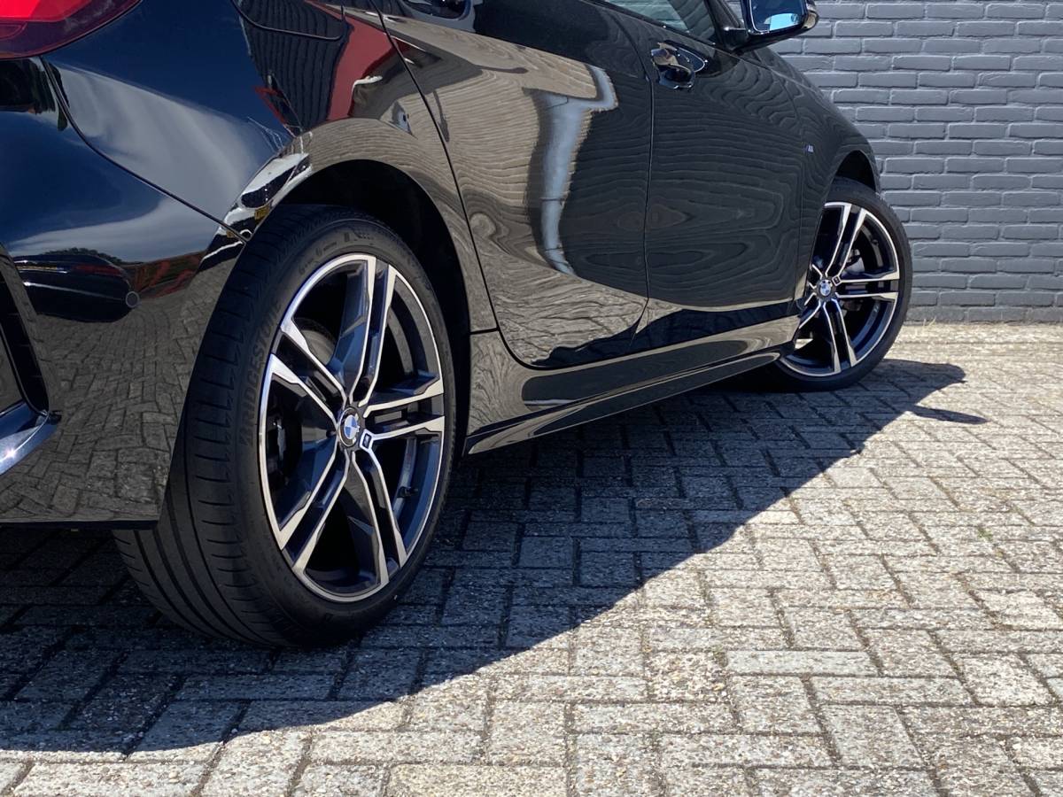 BMW 1 Serie BMW 1-serie 118i M-Sport 136 pk AUT. | 1e eigenaar | dealer onderh. | navigatie | leder sportstoelen | stoel-stuurverwarming