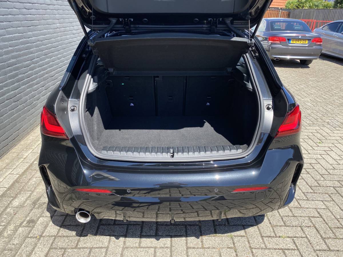 BMW 1 Serie BMW 1-serie 118i M-Sport 136 pk AUT. | 1e eigenaar | dealer onderh. | navigatie | leder sportstoelen | stoel-stuurverwarming