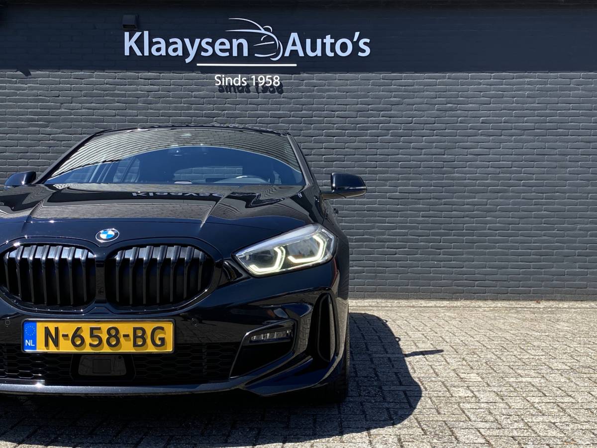 BMW 1 Serie BMW 1-serie 118i M-Sport 136 pk AUT. | 1e eigenaar | dealer onderh. | navigatie | leder sportstoelen | stoel-stuurverwarming