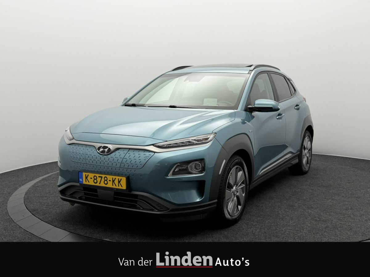 Hyundai Kona Hyundai Kona EV Limited 64 kWh 3- Fase SOH 95,6% | Warmtepomp | Elektrisch Schuif/Kanteldak | Camera | Leer | Head-Up Display