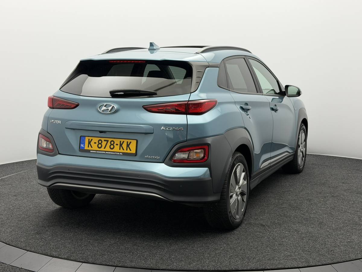 Hyundai Kona Hyundai Kona EV Limited 64 kWh 3- Fase SOH 95,6% | Warmtepomp | Elektrisch Schuif/Kanteldak | Camera | Leer | Head-Up Display